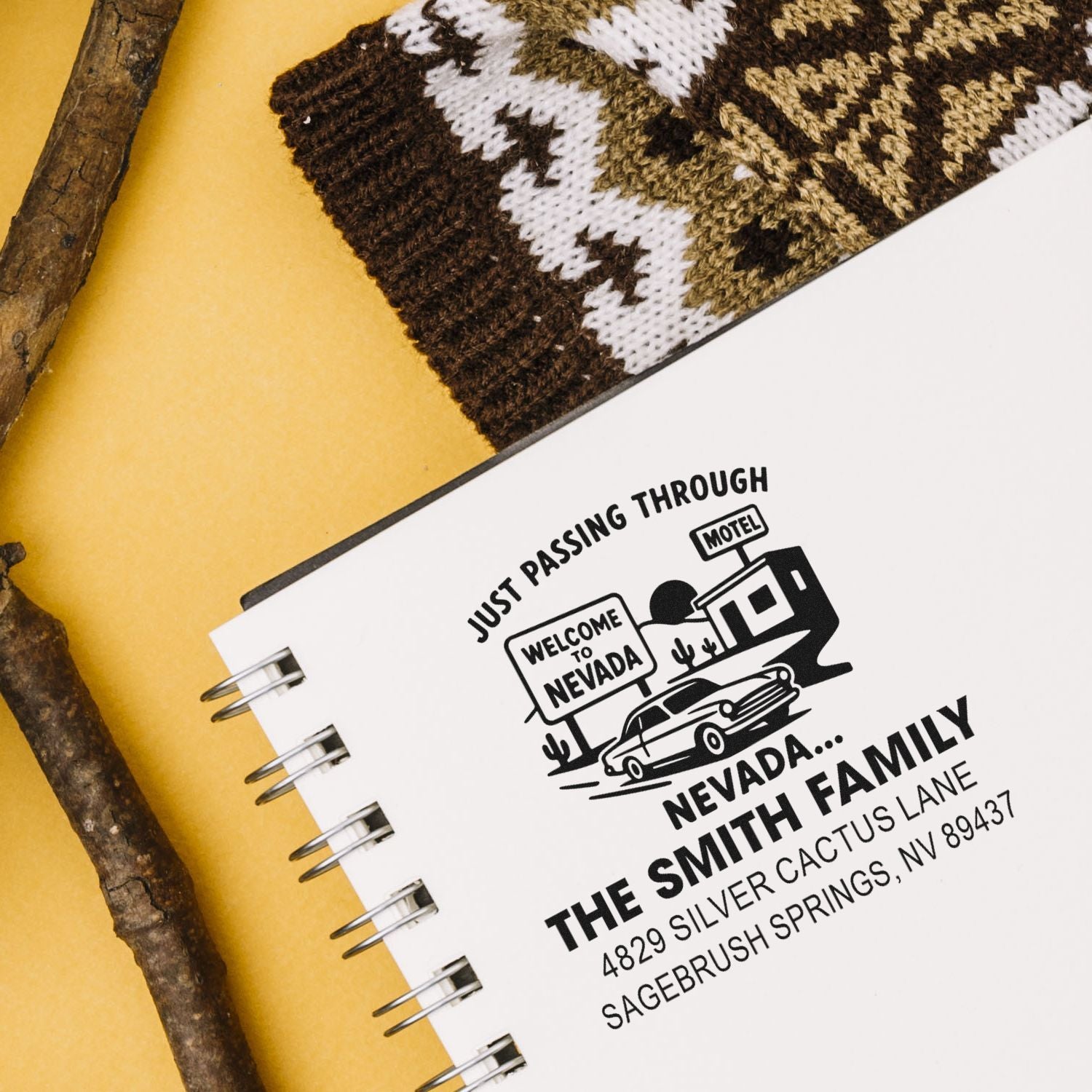 Custom rubber stamp design reading Just Passing Through Nevada for a personalized family travel journal and address label.