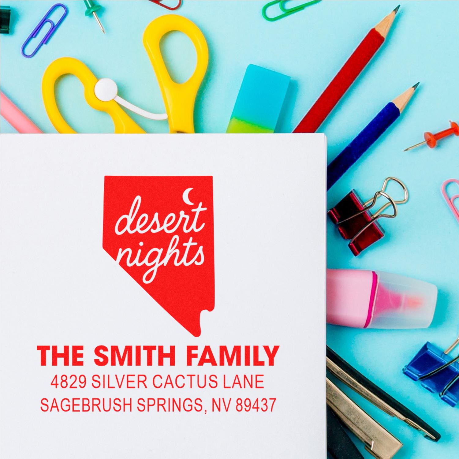 Custom rubber address stamp for The Smith Family, featuring a Desert Nights design on a white card with colorful stationery.