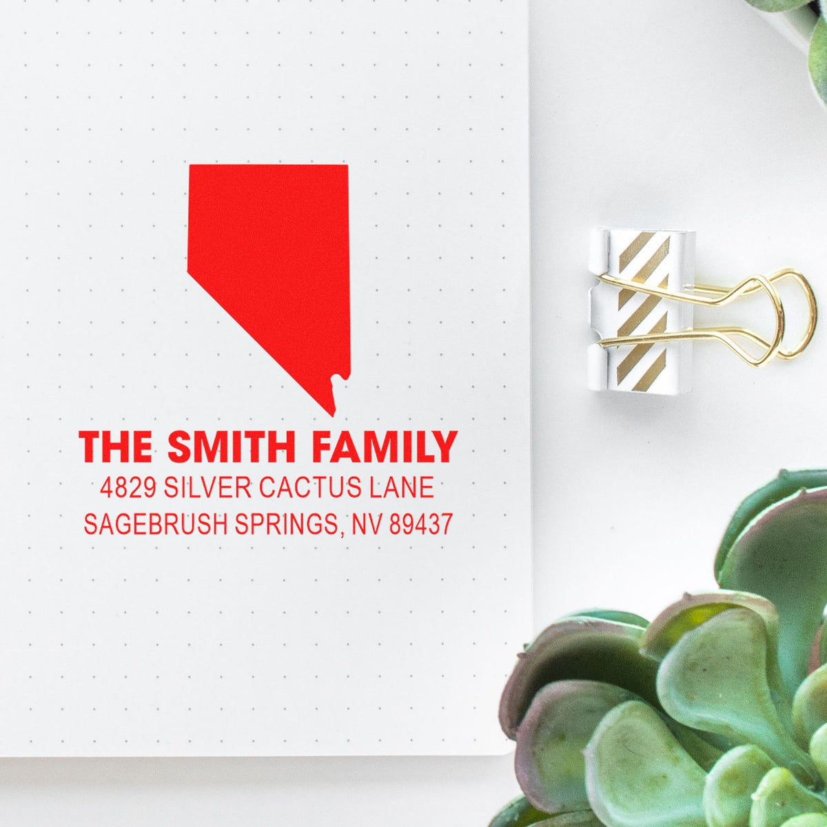 Personalized return address rubber stamp for The Smith Family, featuring Nevada address and custom state design.