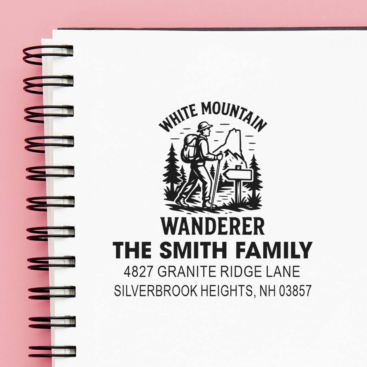 Personalized rubber return address stamp for The Smith Family with White Mountain hiker design for outdoor-themed mail.