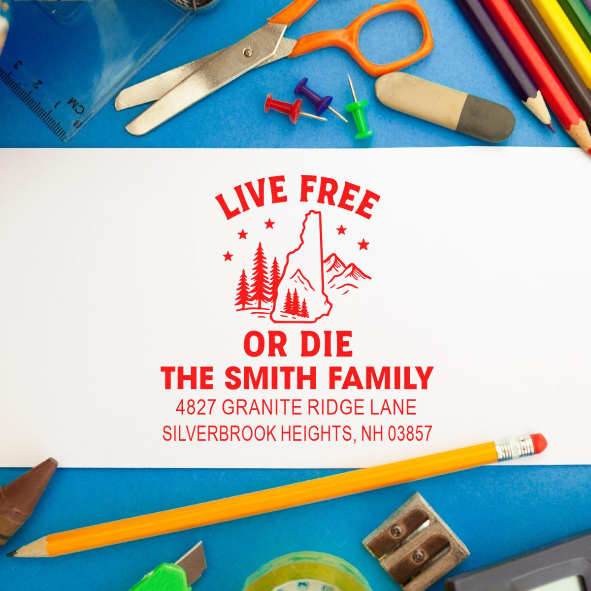 Custom rubber address stamp with Live Free or Die family design, ideal for personalized stationery and crafts.