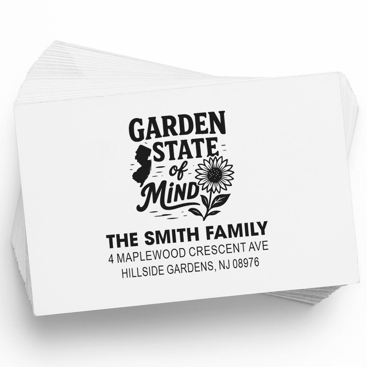 Custom garden-themed return address rubber stamp with sunflower design, family name, and New Jersey address on sample card