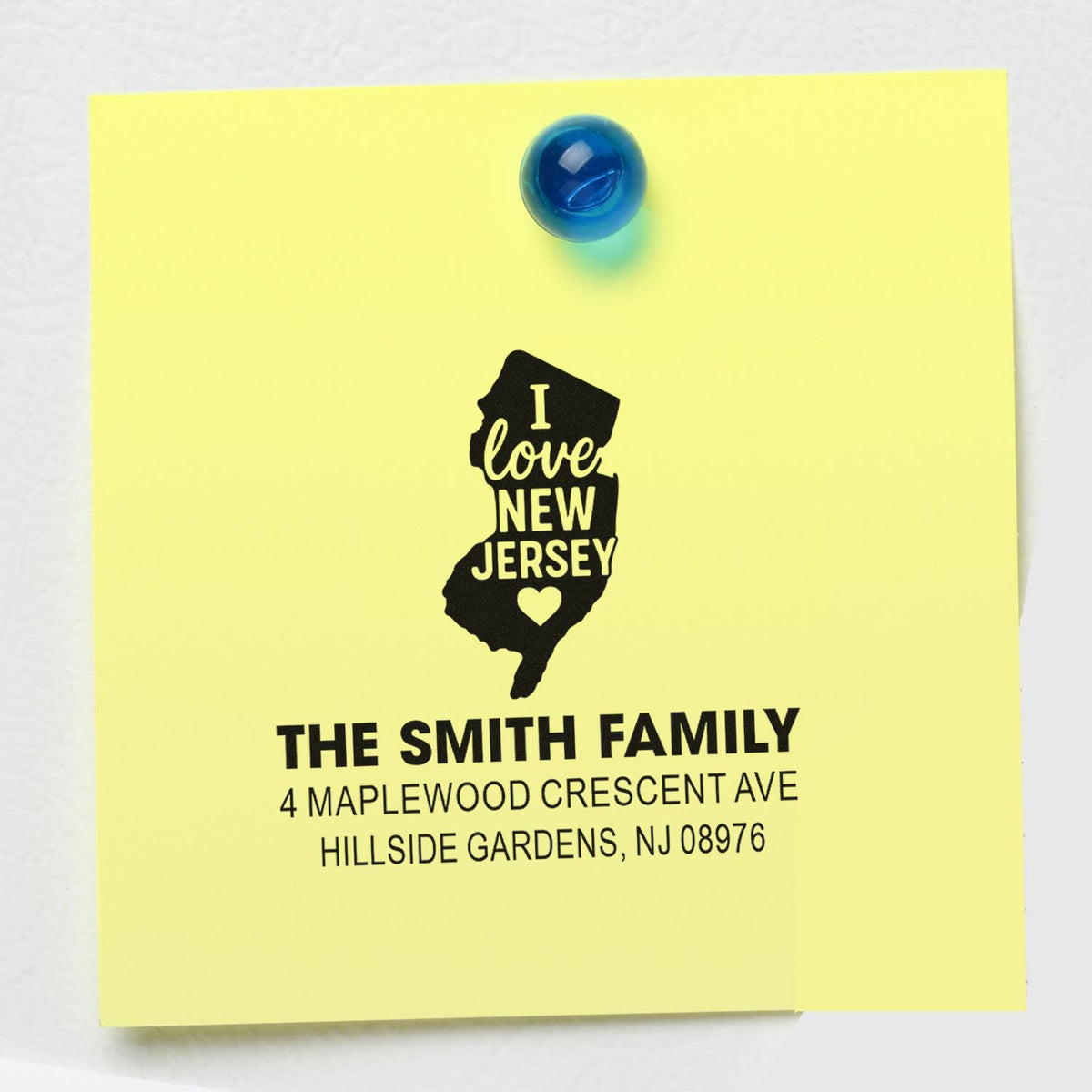Custom rubber address stamp with I Love New Jersey design and family name for personalized mailing.