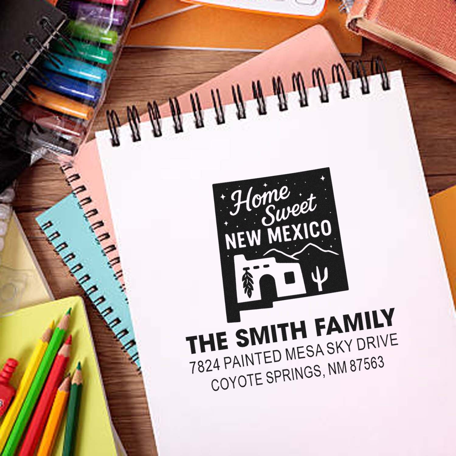 Custom rubber stamp mockup with Home Sweet New Mexico return address for personalized family stationery.