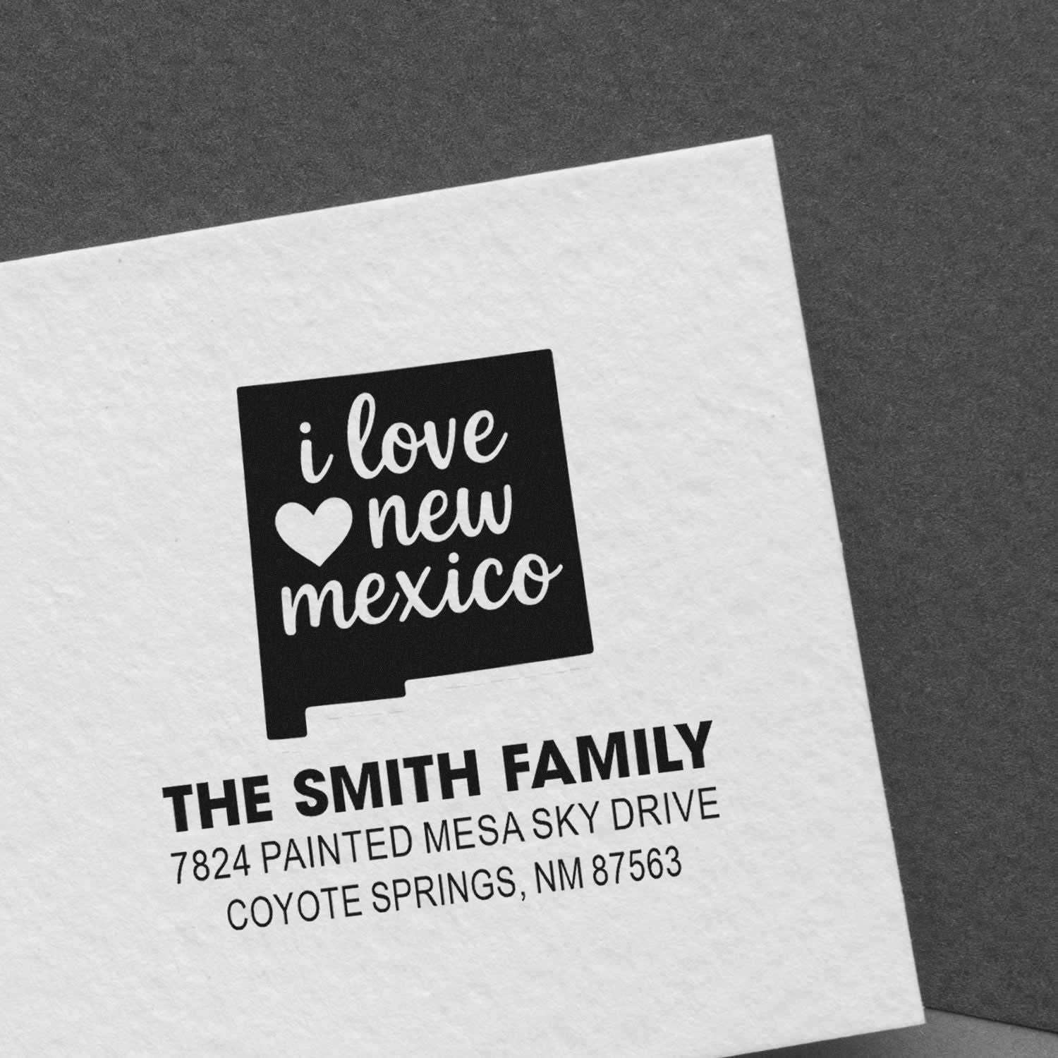 Custom New Mexico return address rubber stamp with I love New Mexico design and Smith family mailing address.