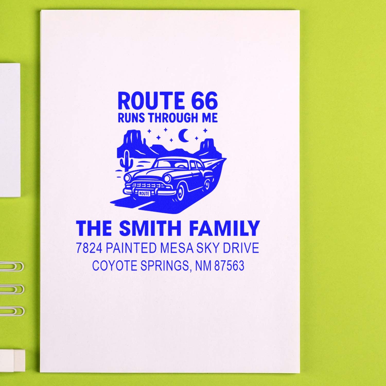 Custom rubber stamp with Route 66 car design and The Smith Family return address in blue ink.