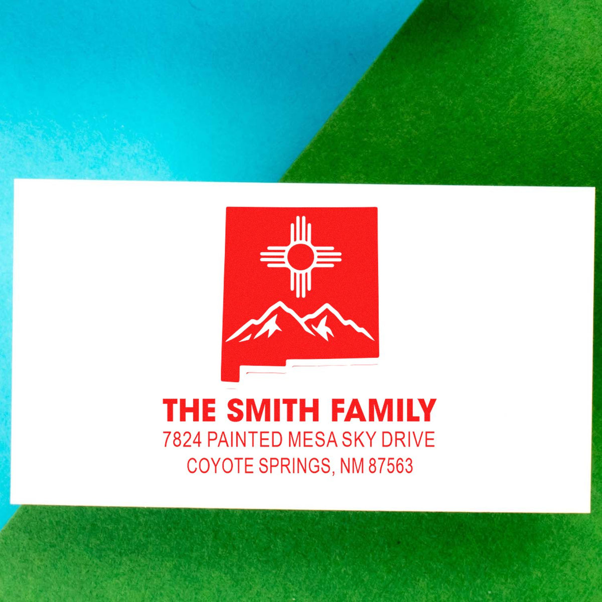 Custom address rubber stamp for The Smith Family, with New Mexico Zia design and return address for Coyote Springs, NM.