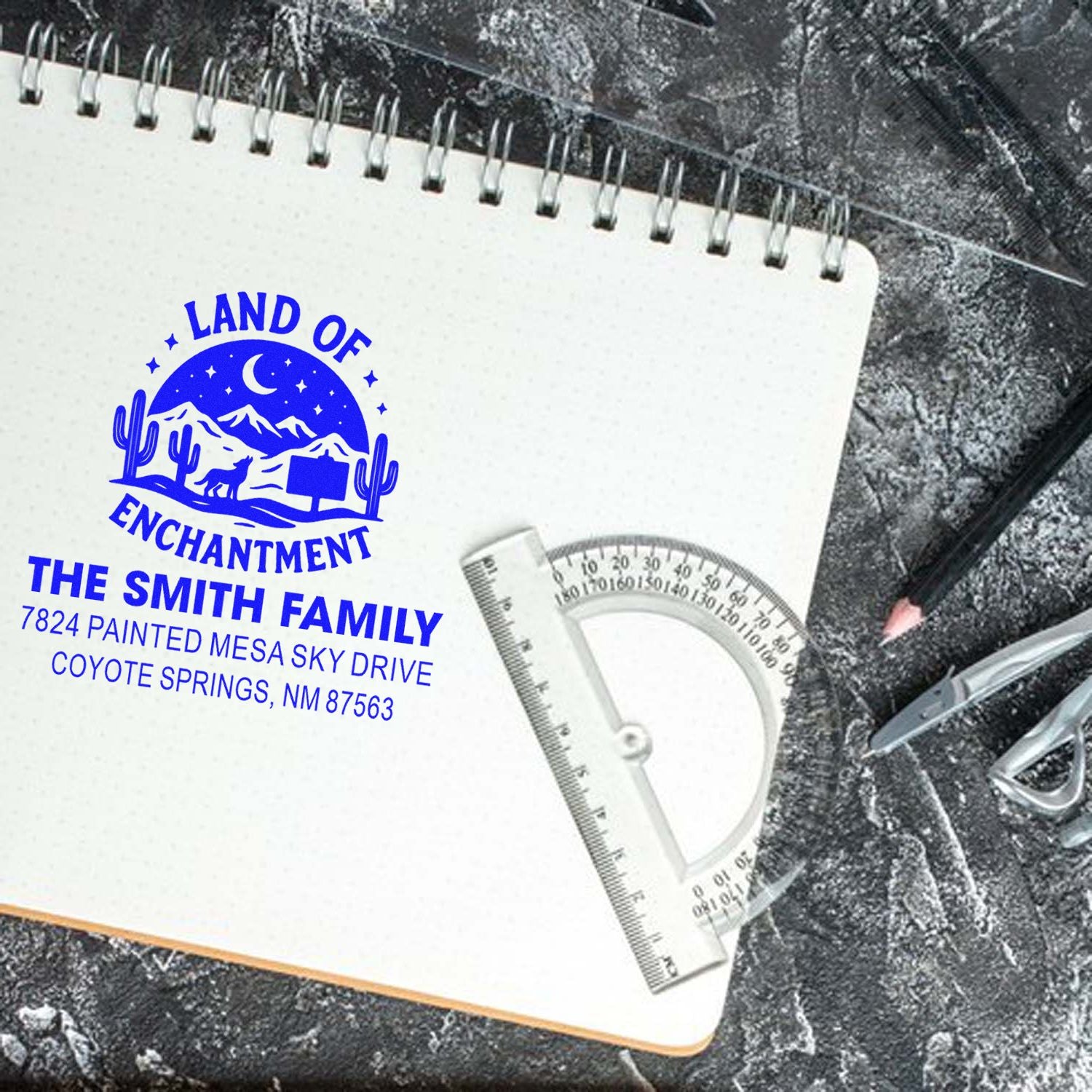 Custom rubber address stamp with Land of Enchantment design and Smith family return address for Coyote Springs, NM.