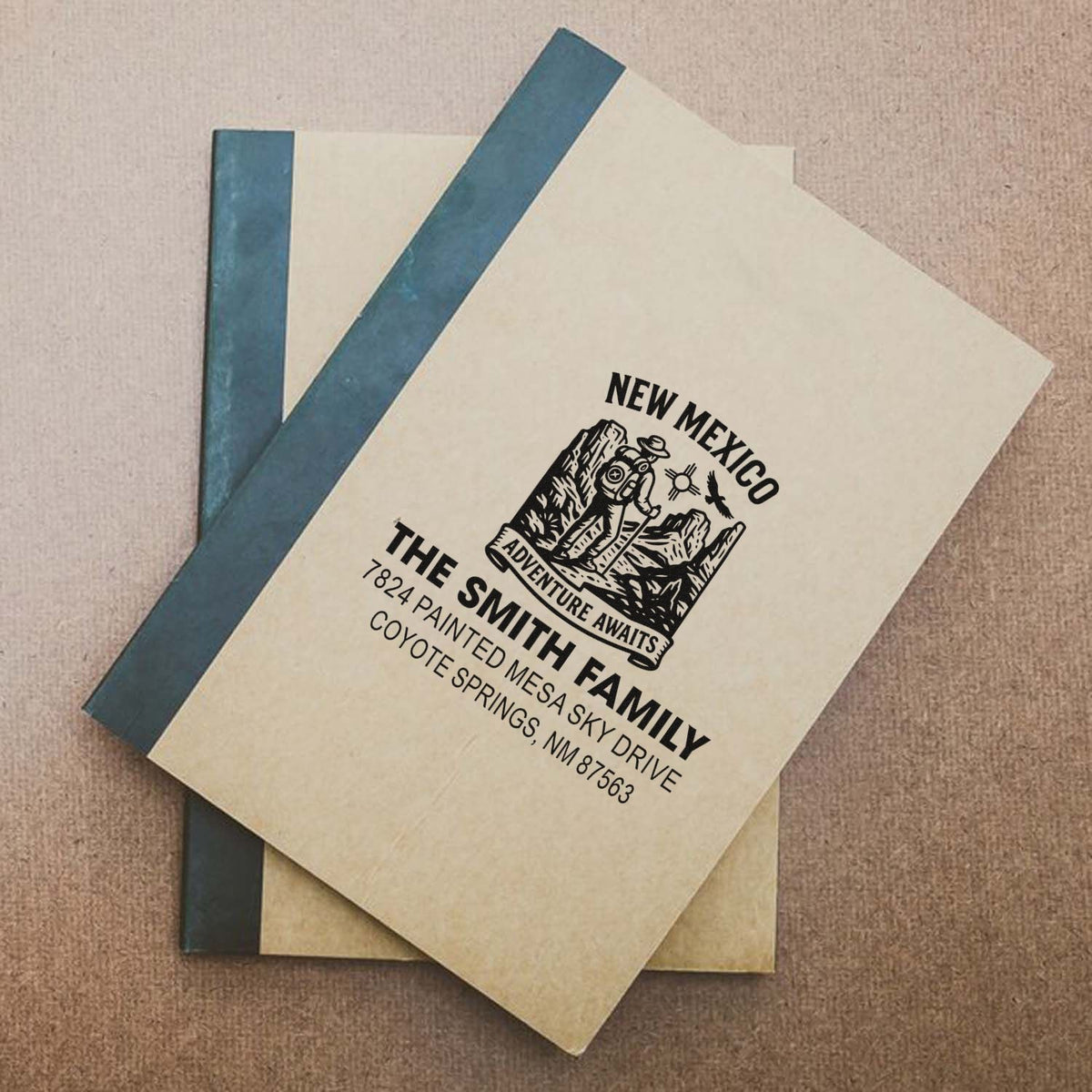 Custom rubber address stamp for The Smith Family with New Mexico adventure logo on personalized stationery