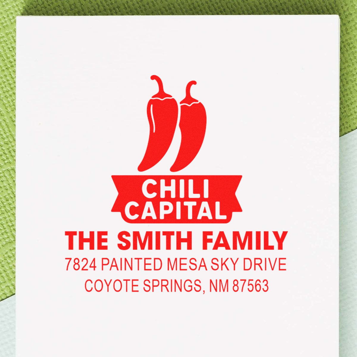 Custom return address rubber stamp with chili pepper logo for The Smith Family, Coyote Springs, NM.