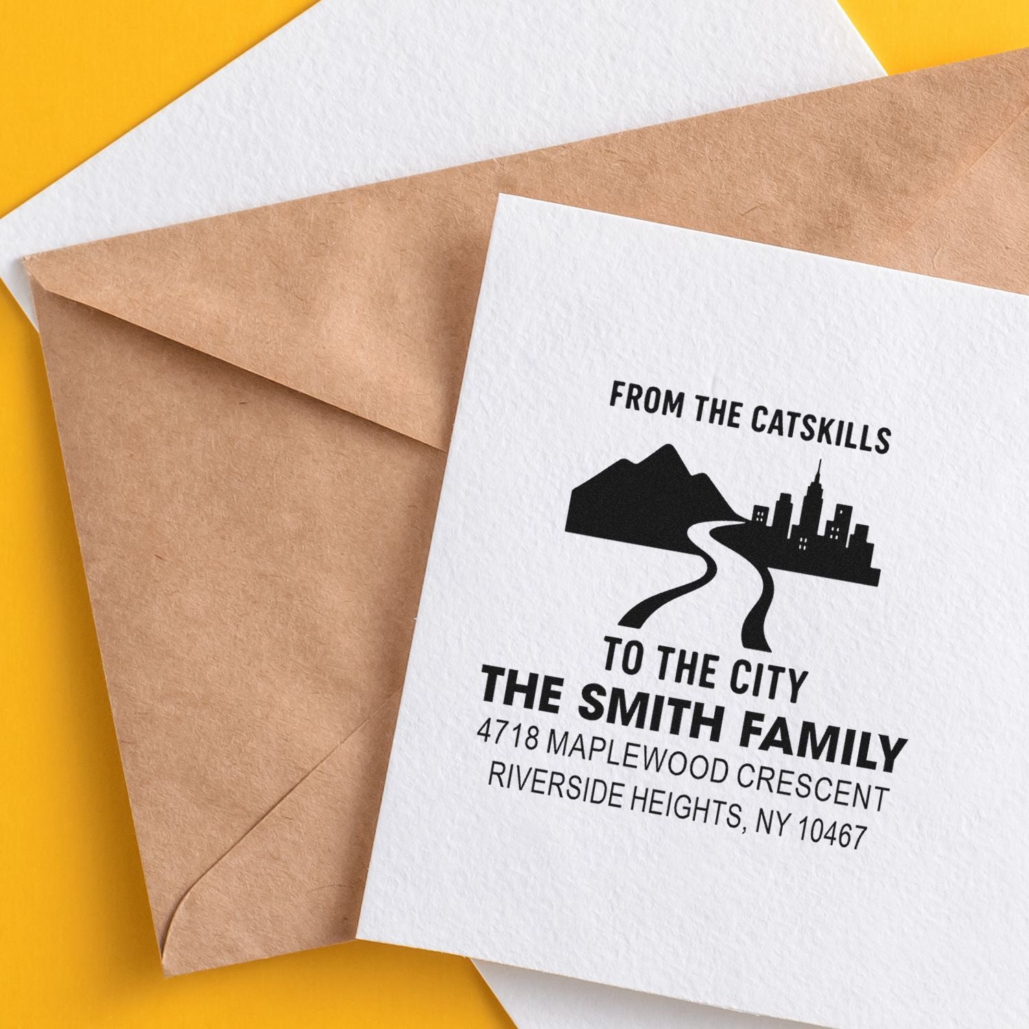 Custom rubber stamp on envelope for a personalized family return address, From the Catskills to the City.