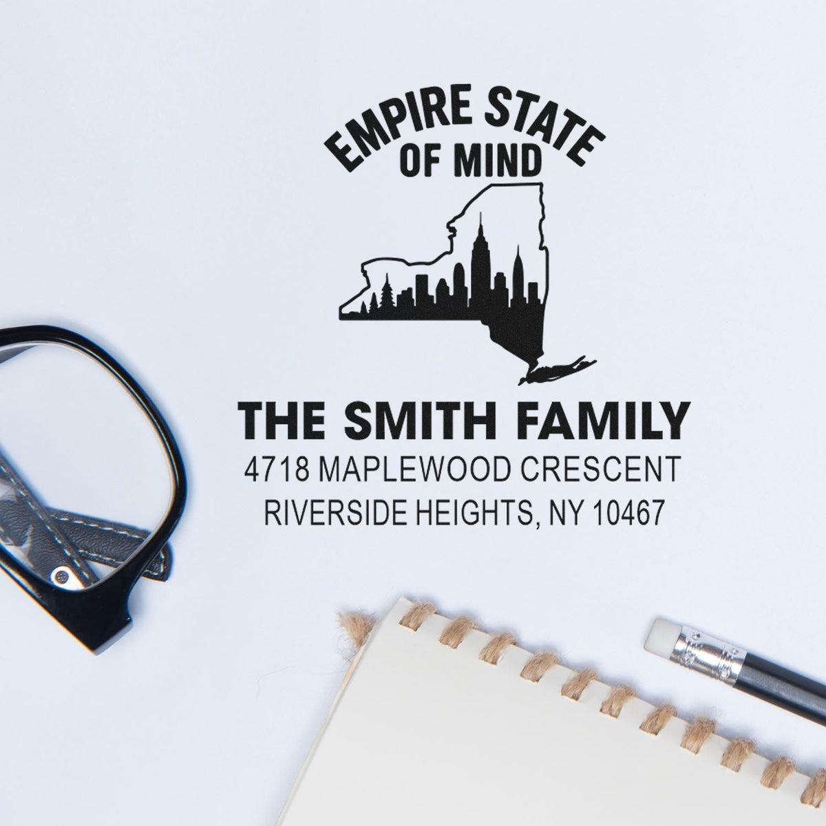Custom New York return address rubber stamp for The Smith Family, featuring state outline and personalized mailing details.