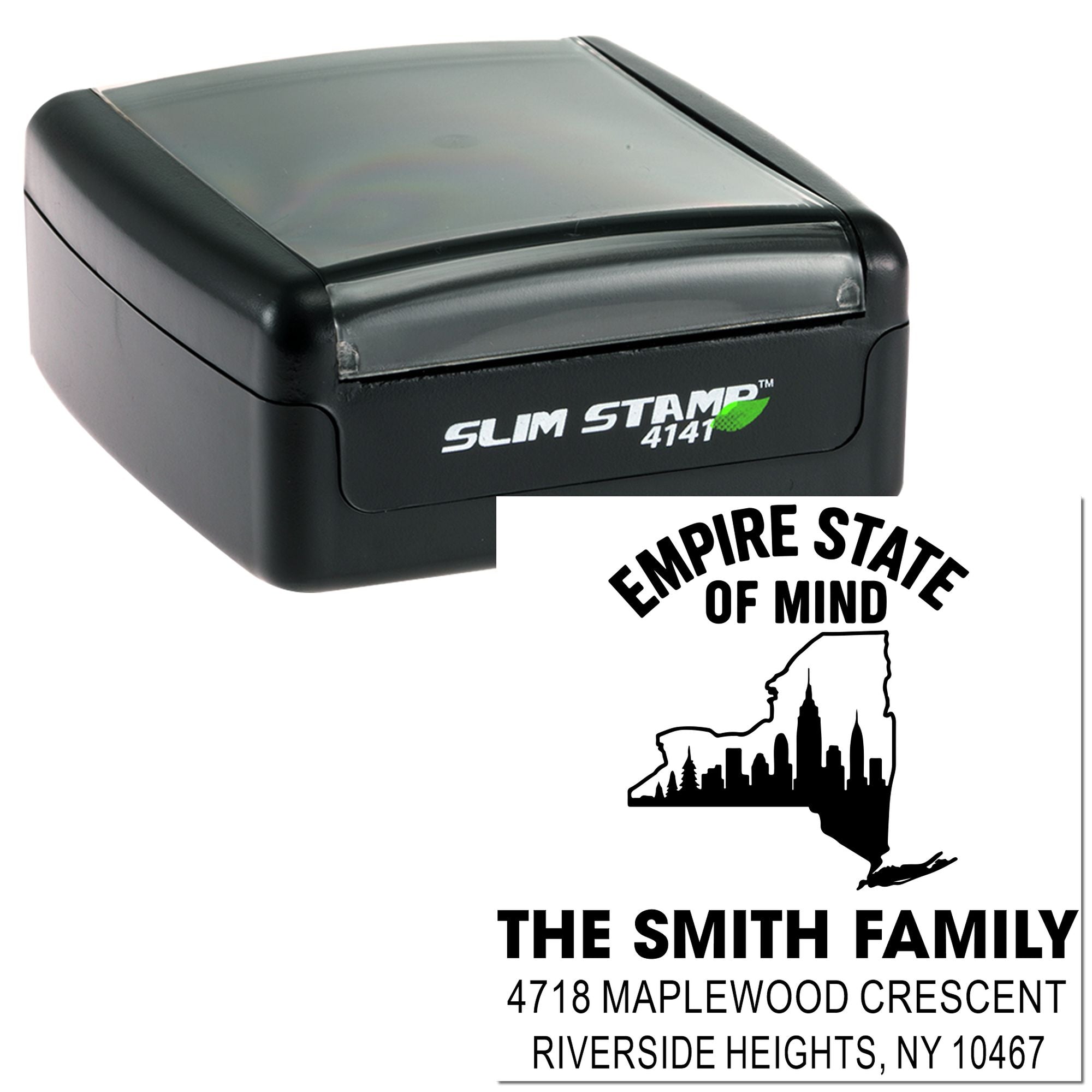 Slim self-inking rubber address stamp with custom New York family return address and Empire State of Mind design
