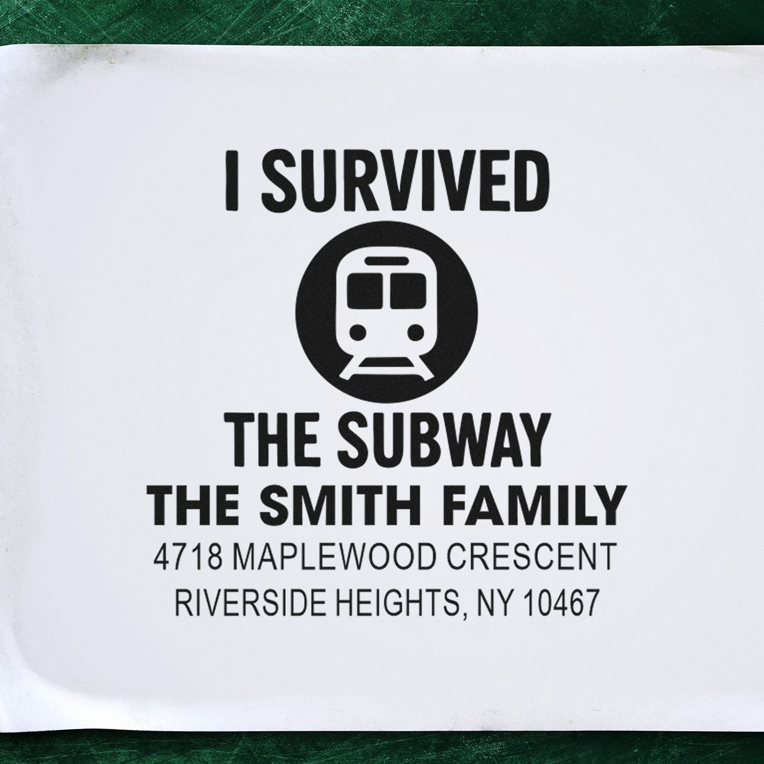 Custom rubber stamp design reading I Survived the Subway for The Smith Family, with train icon and address.