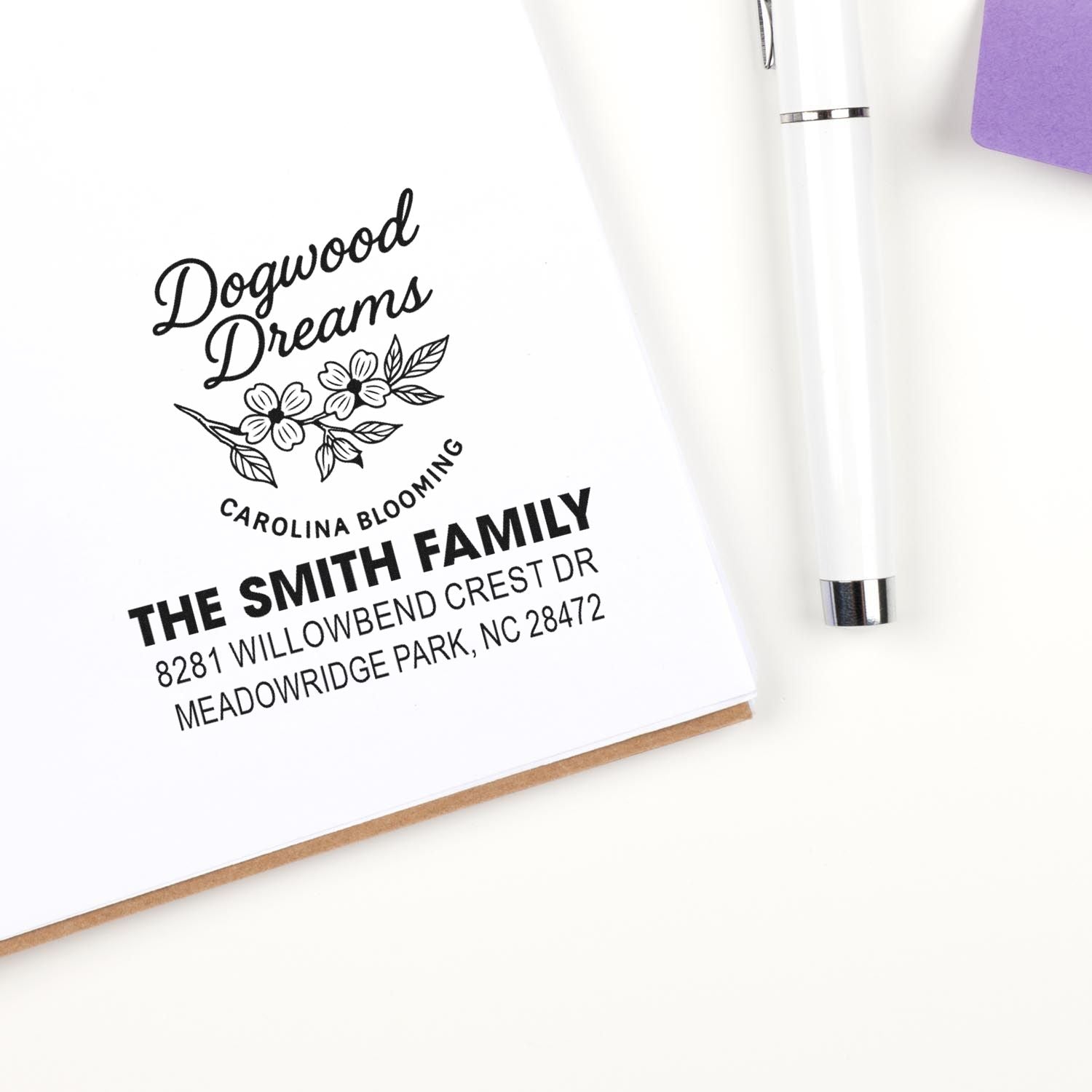 Custom return address rubber stamp with floral dogwood design for The Smith Family, perfect for personalized envelopes and stationery.