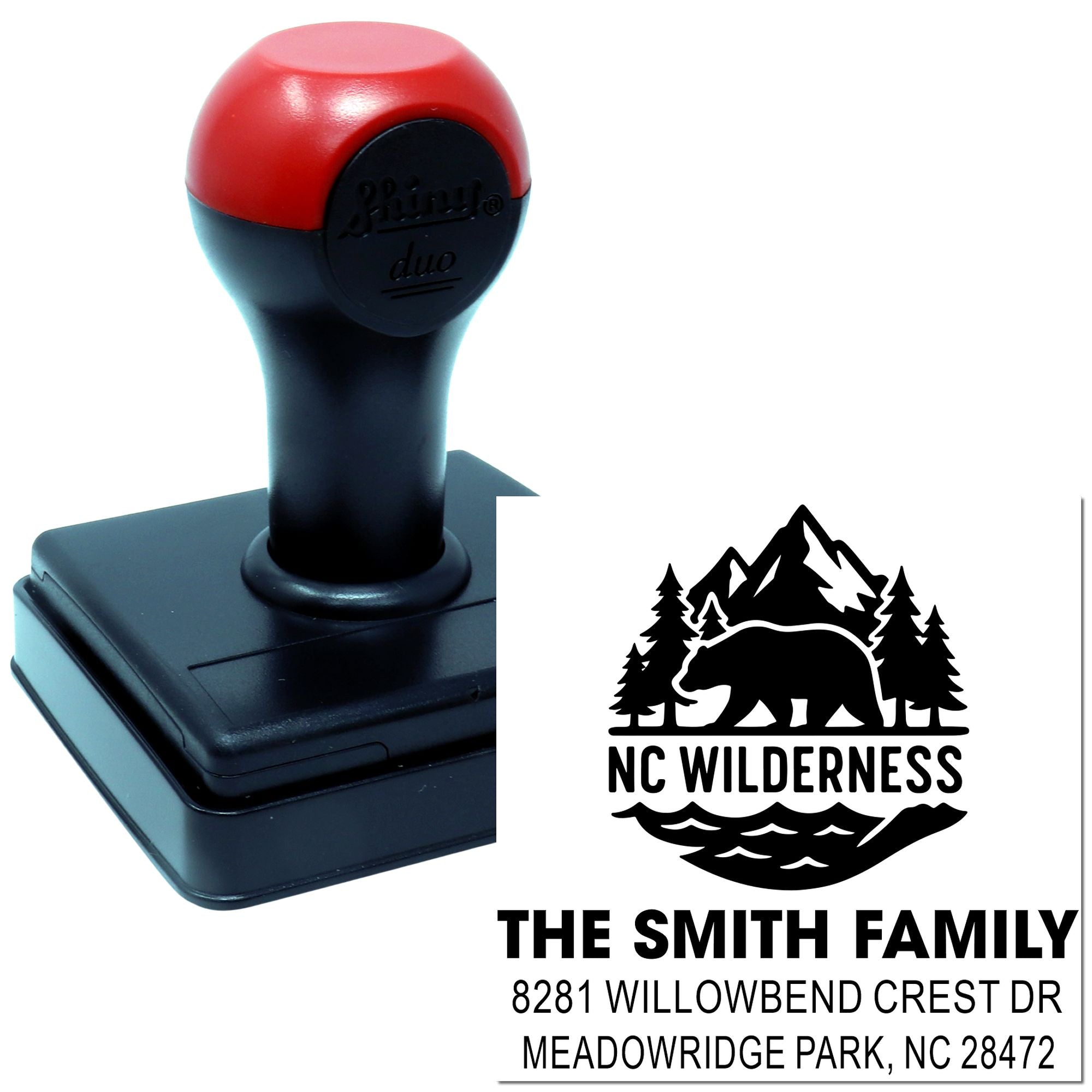 Custom self-inking rubber stamp with NC Wilderness bear design and Smith Family return address for personalized mailing.
