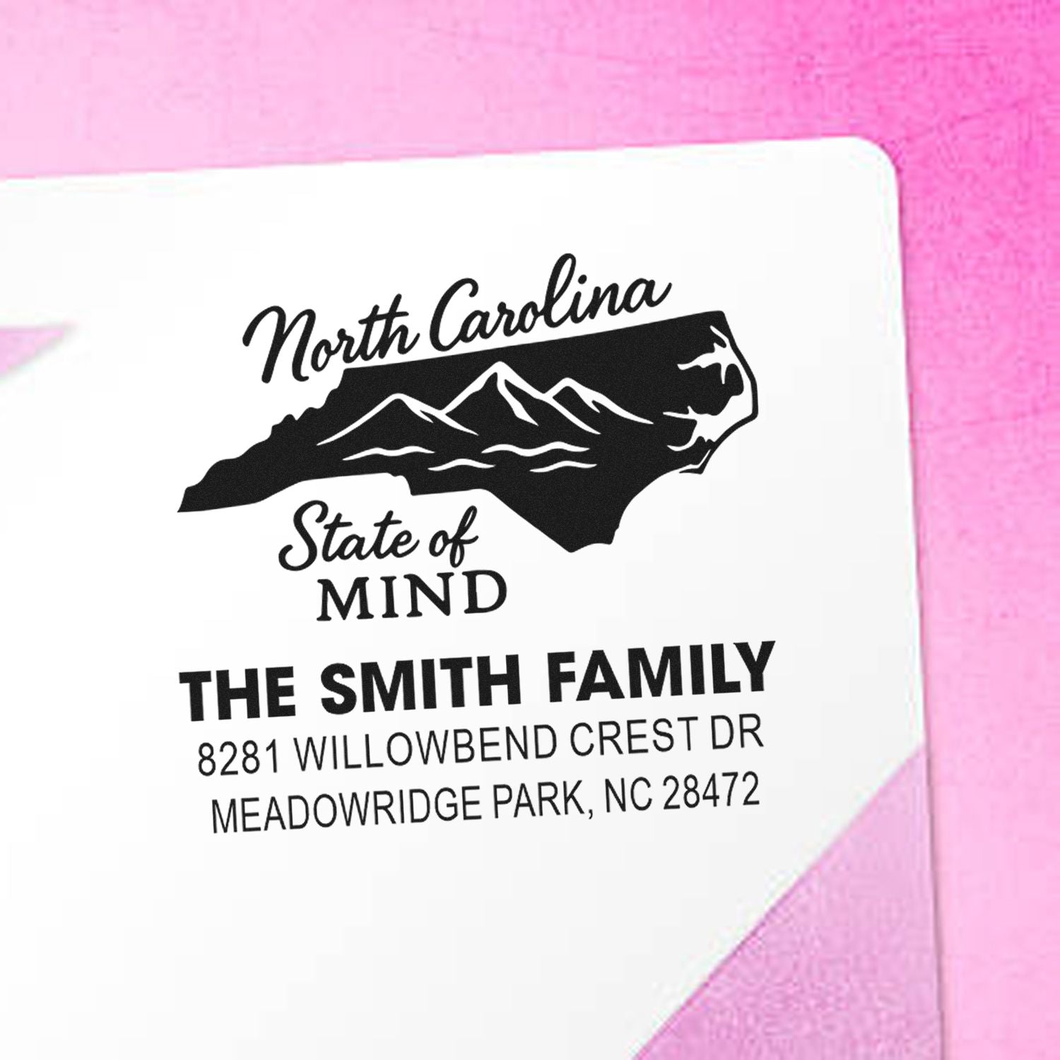 North Carolina custom family return address rubber stamp with state silhouette, mountains, and personalized mailing address.