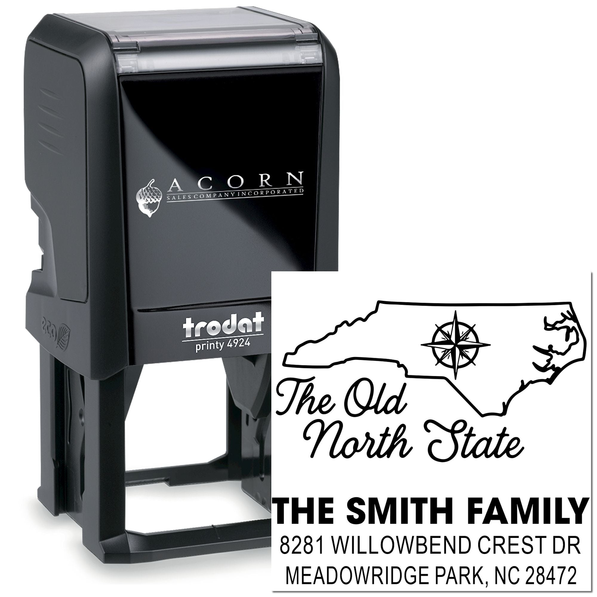 Custom self-inking rubber address stamp with North Carolina state design, family name, and return address.