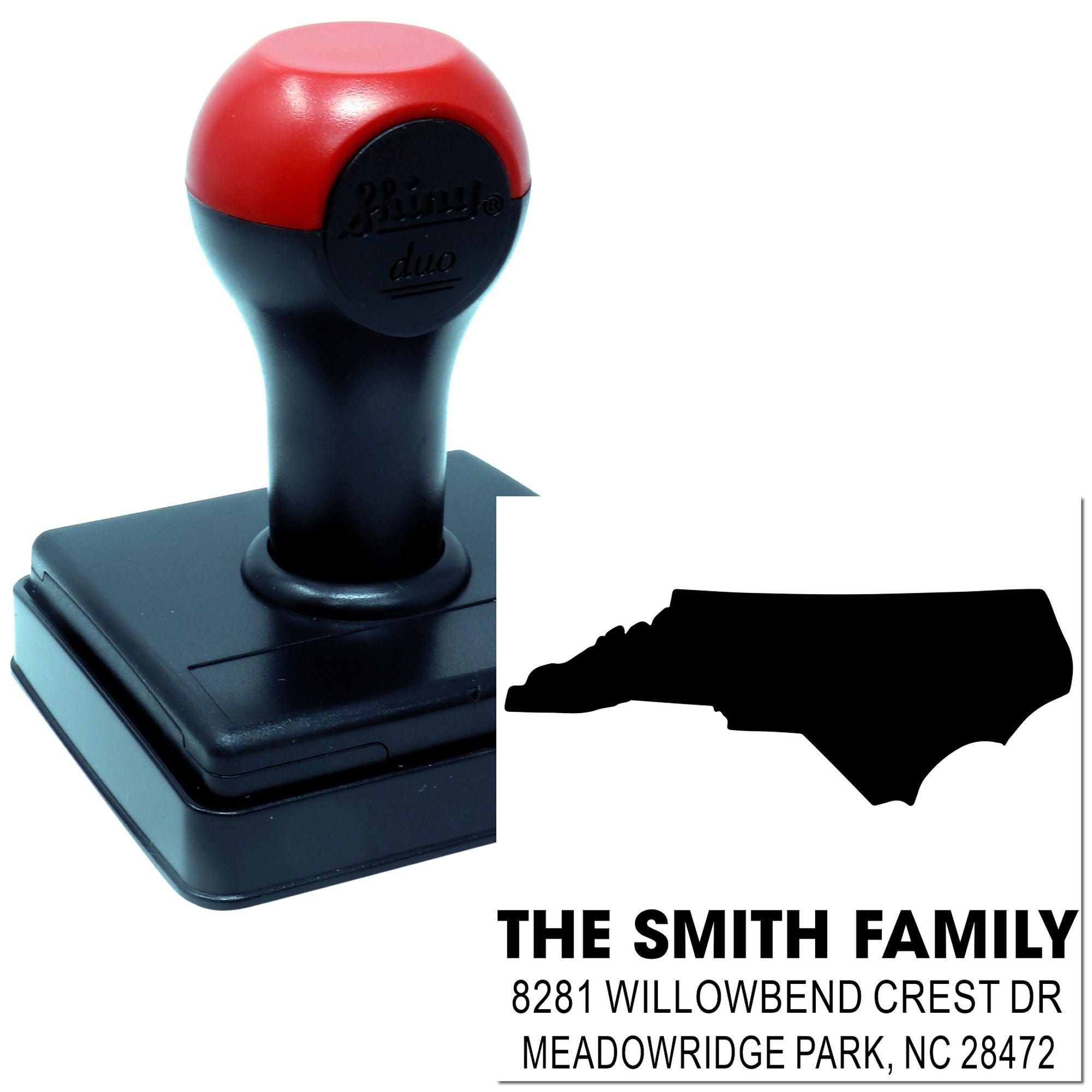 Custom North Carolina return address rubber stamp with family name, state silhouette, and mailing address.