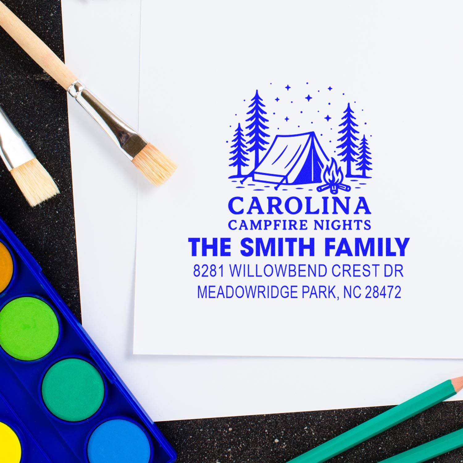 Custom rubber stamp with tent and campfire design, personalized for The Smith Family with Carolina Campfire Nights address imprint.