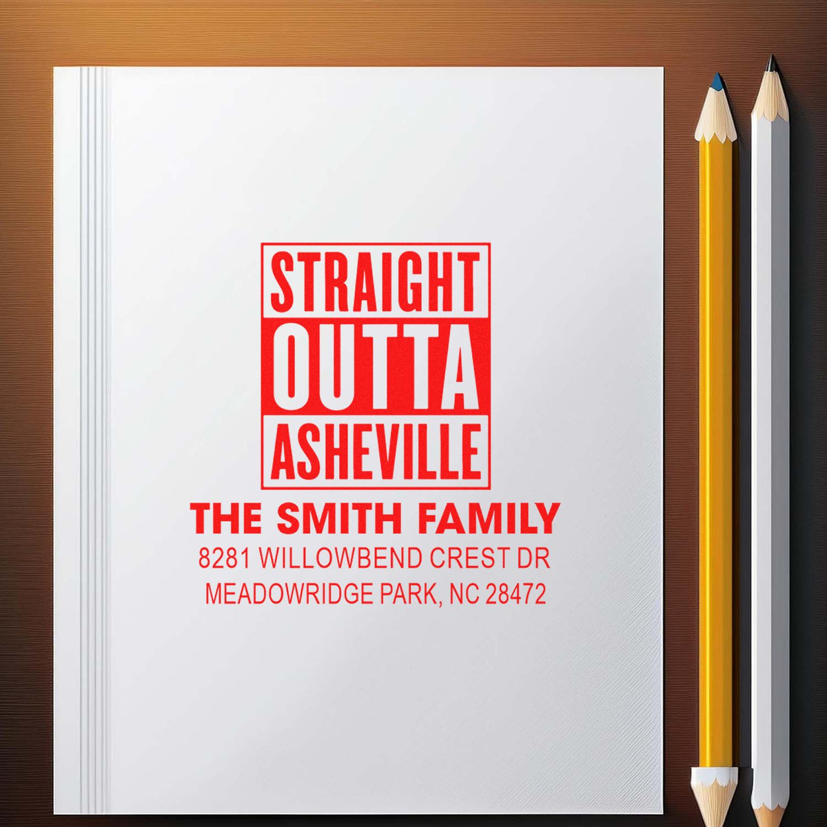Personalized rubber stamp mockup with Straight Outta Asheville family address design for custom mailings.