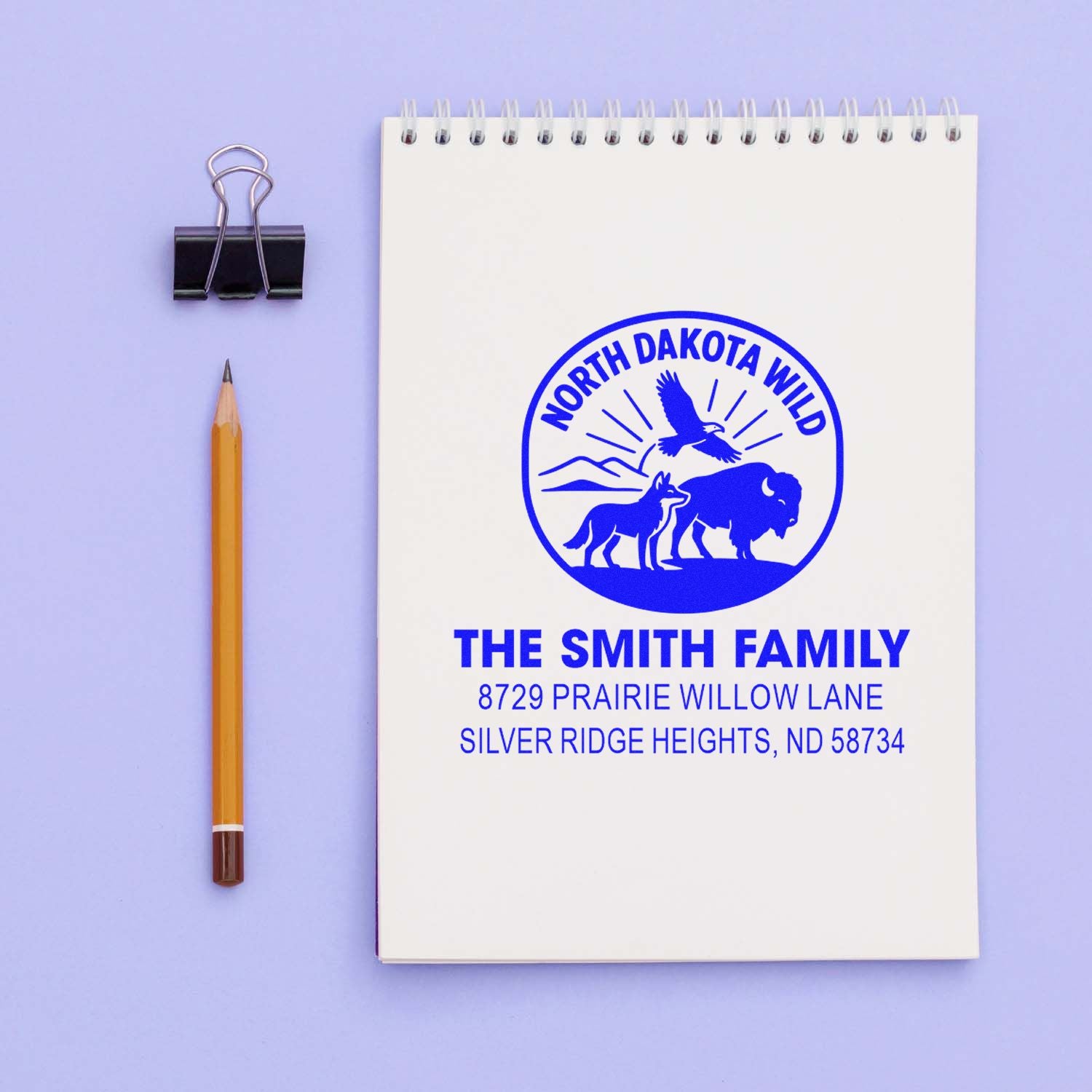 Custom North Dakota Wild family address rubber stamp for The Smith Family, with wildlife logo and return mailing address.