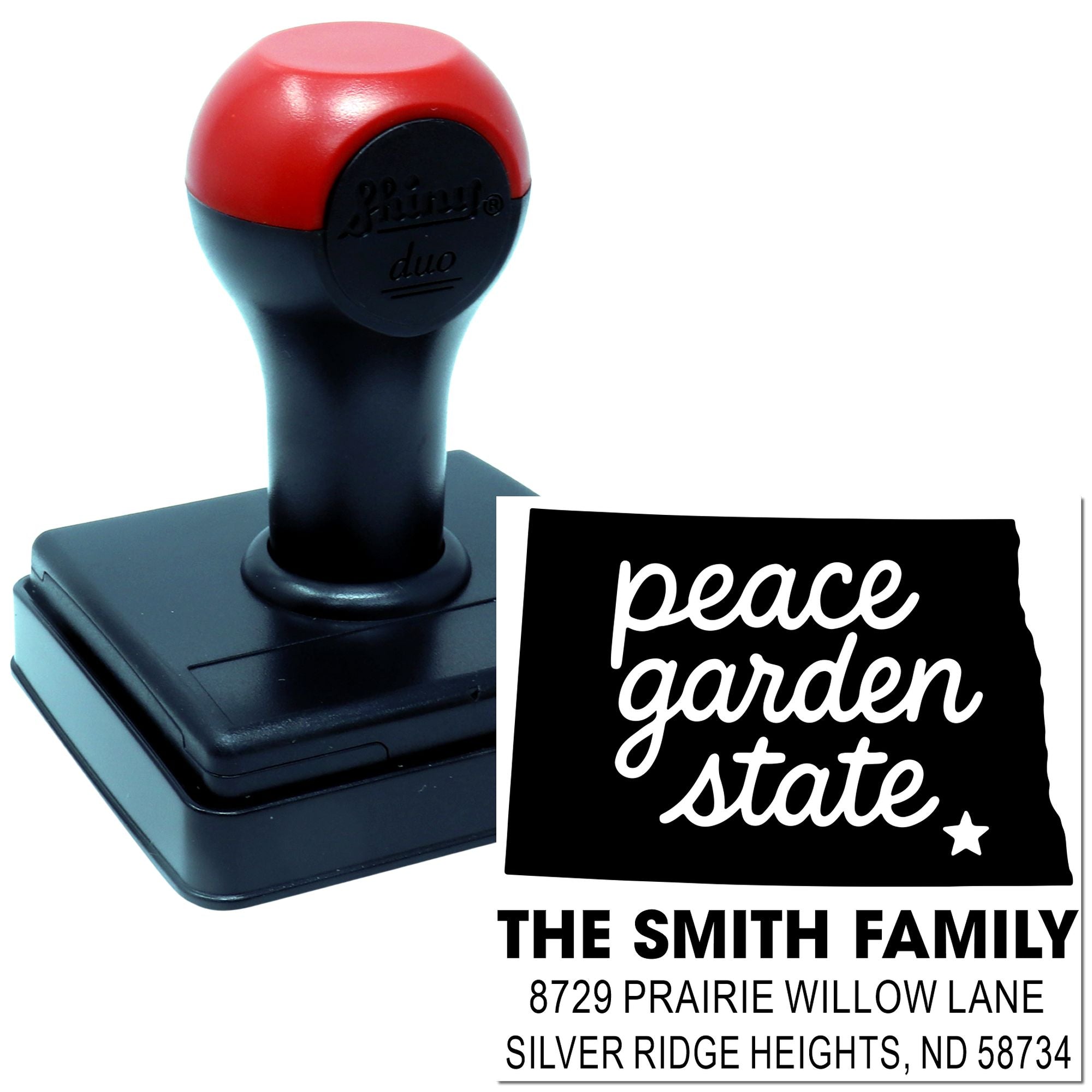 Custom self-inking rubber address stamp featuring peace garden state and The Smith Family mailing address for North Dakota.