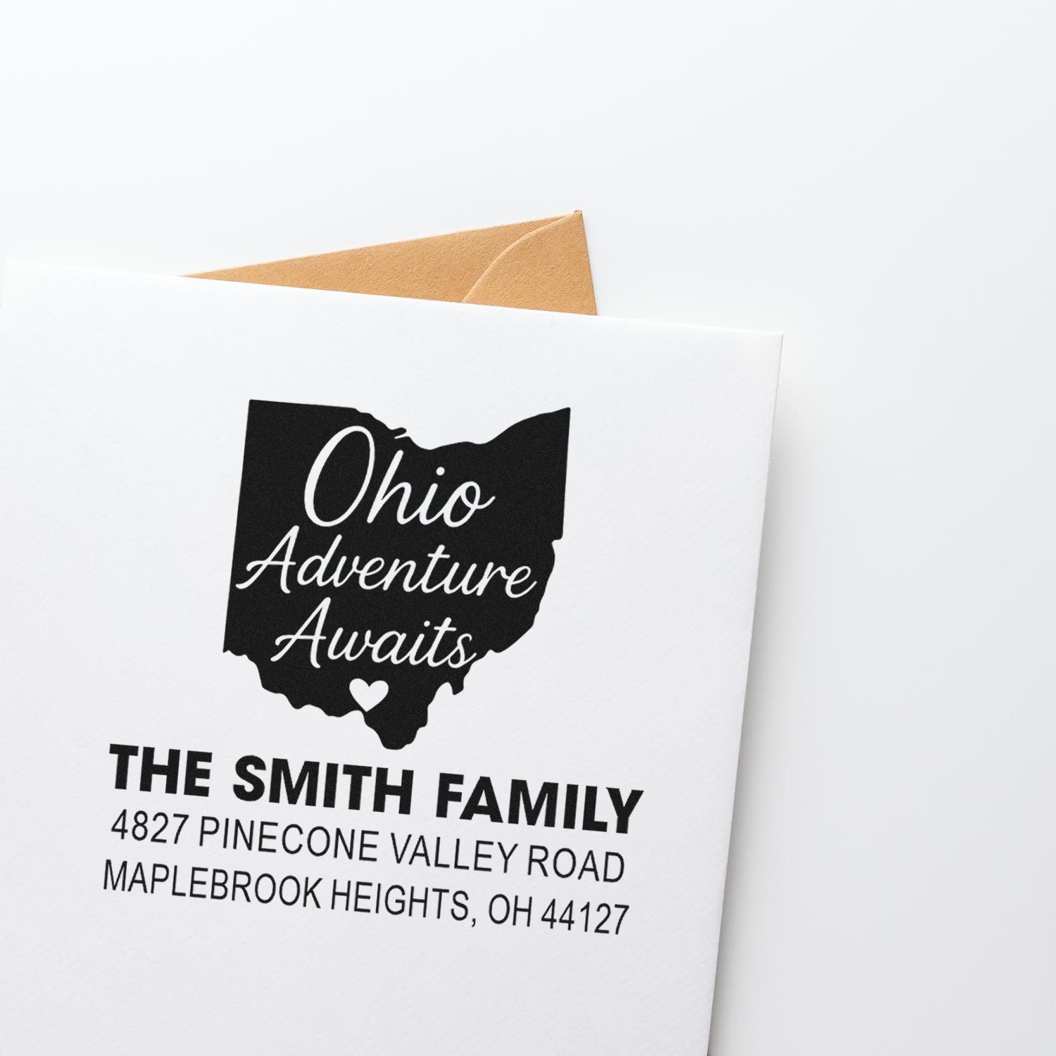 Custom Ohio return address rubber stamp on envelope, featuring Ohio Adventure Awaits and The Smith Family address.