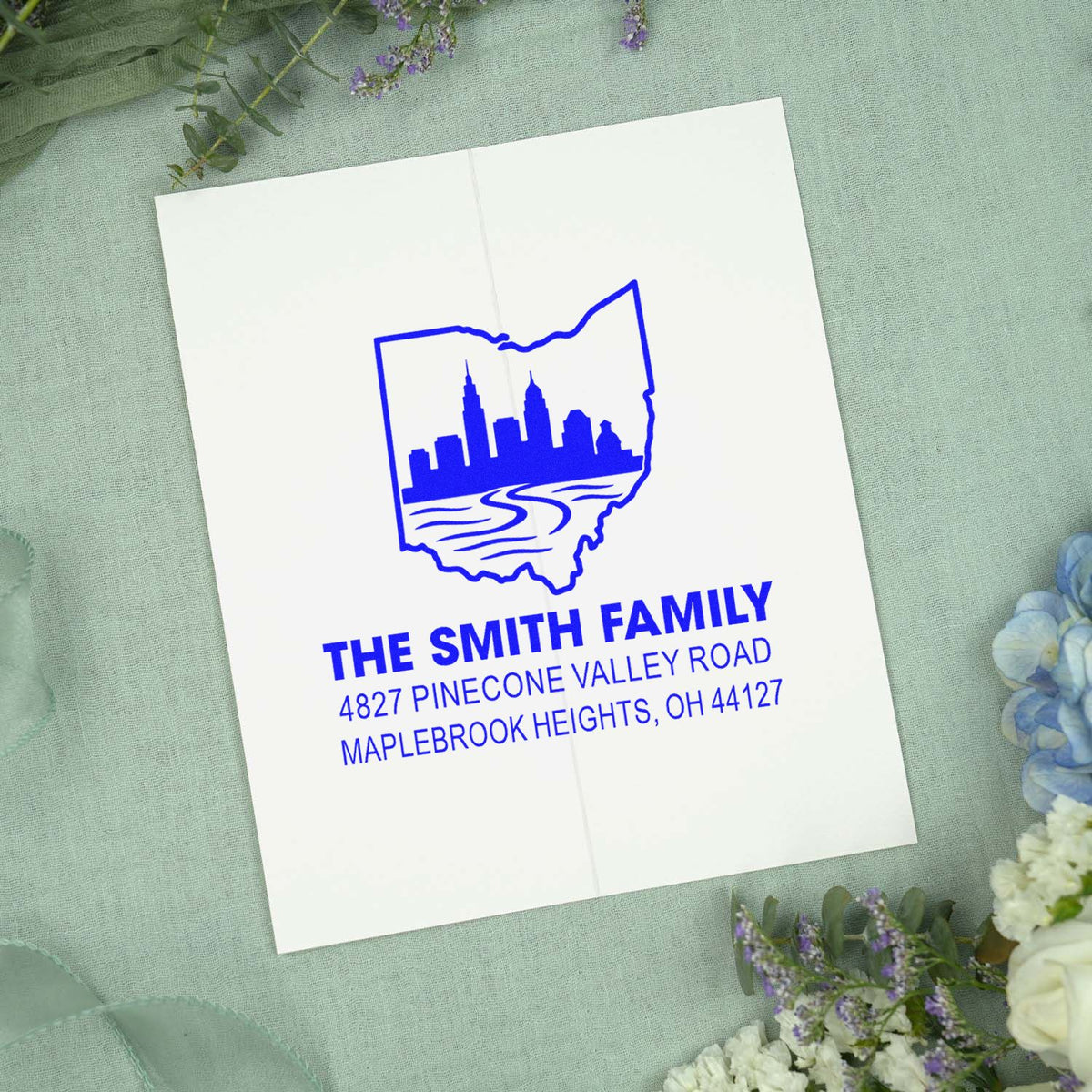 Personalized return address rubber stamp with Ohio skyline design for The Smith Family, Maplebrook Heights, OH.