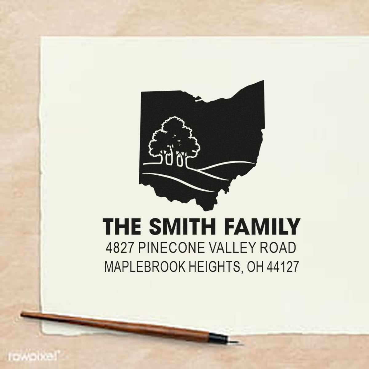 Custom Ohio family address rubber stamp with state silhouette, tree logo, and personalized return address for mailings.