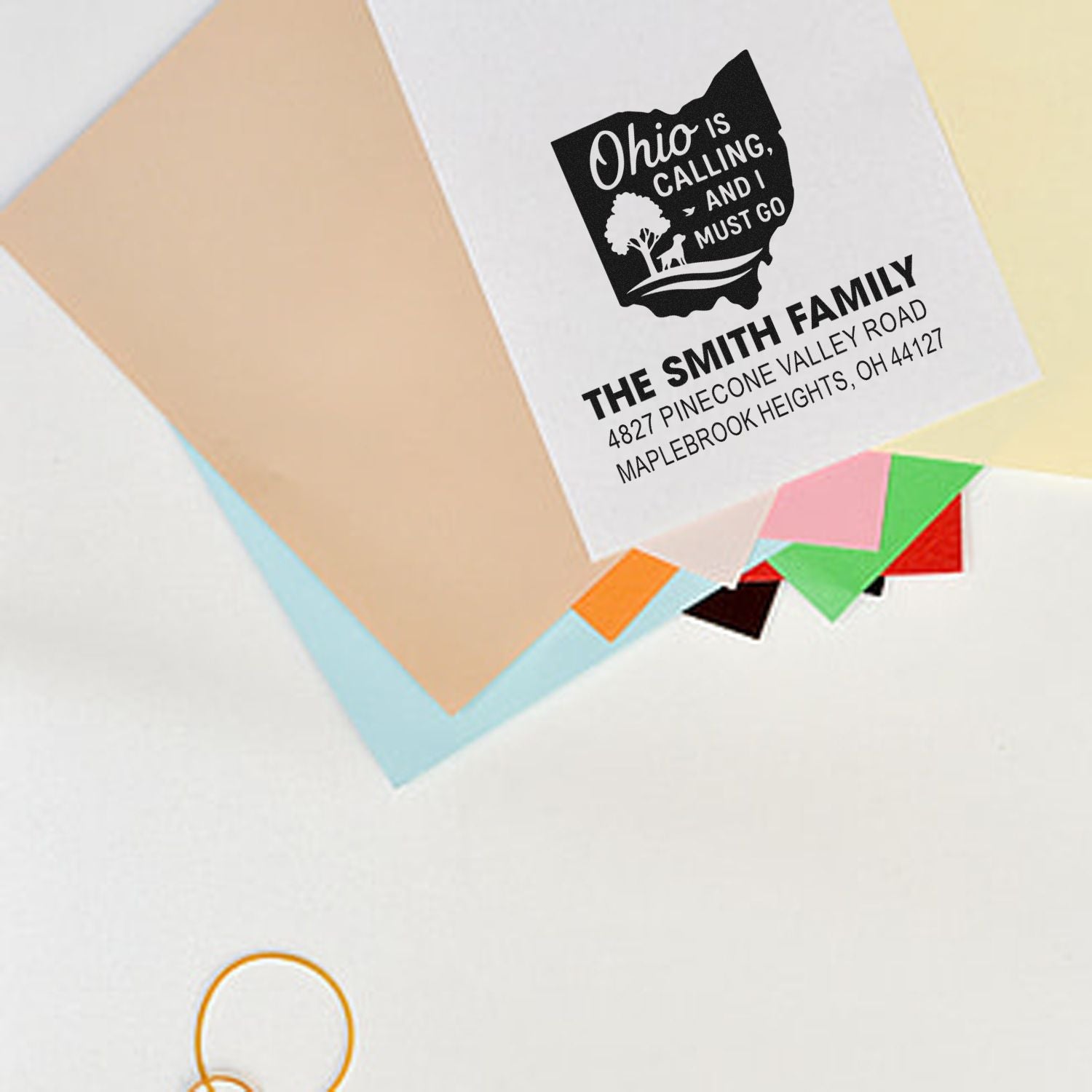Personalized Ohio return address rubber stamp with family name and address for custom envelopes and stationery.