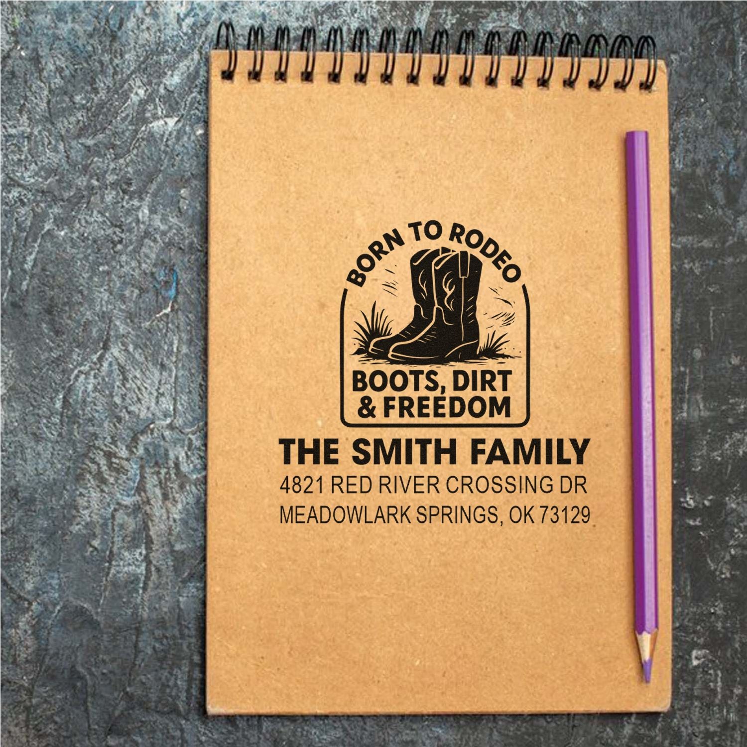 Custom western return address rubber stamp with cowboy boots, family name, and address for rustic mail branding.
