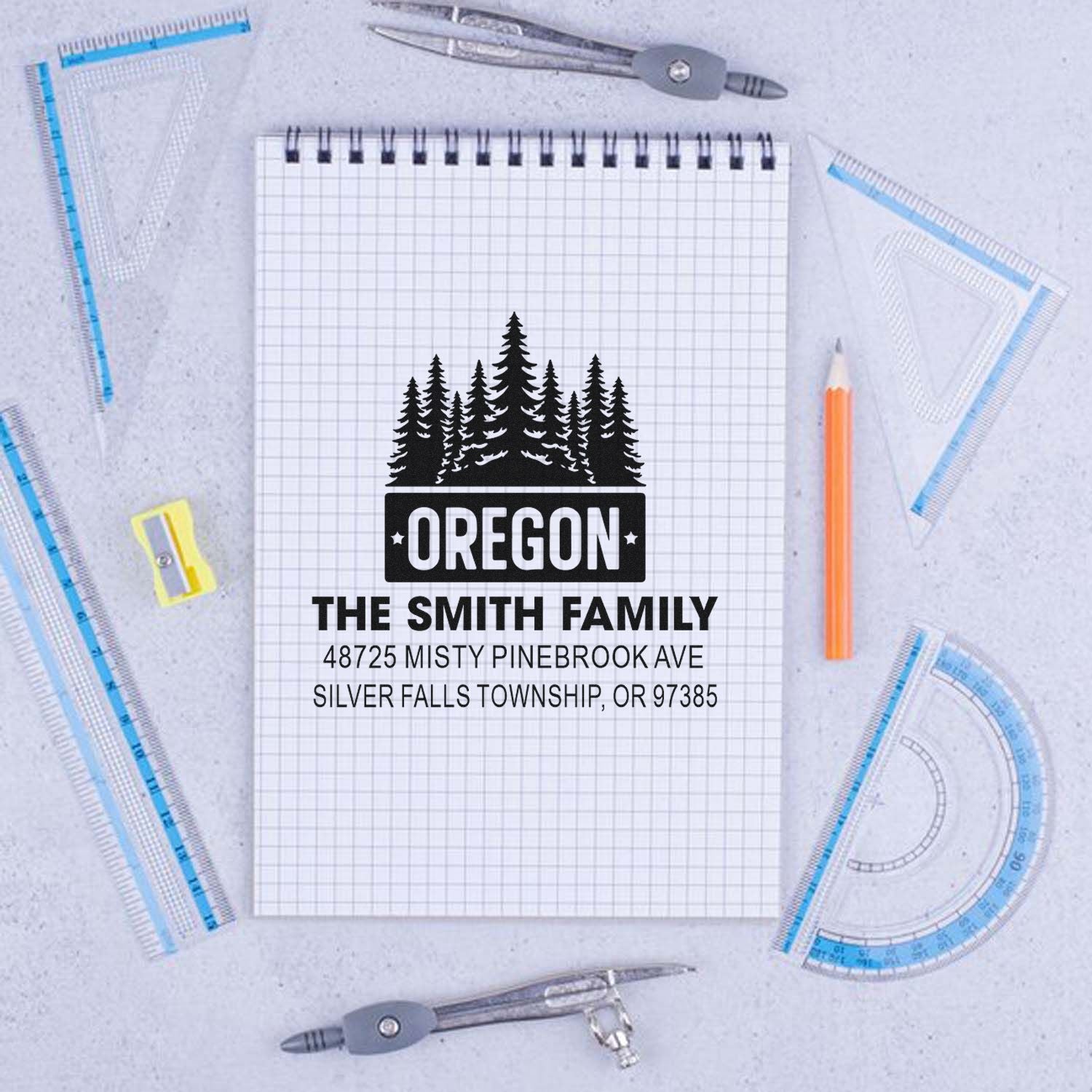 Personalized Oregon address rubber stamp with pine tree design for The Smith Family, Silver Falls Township return address.