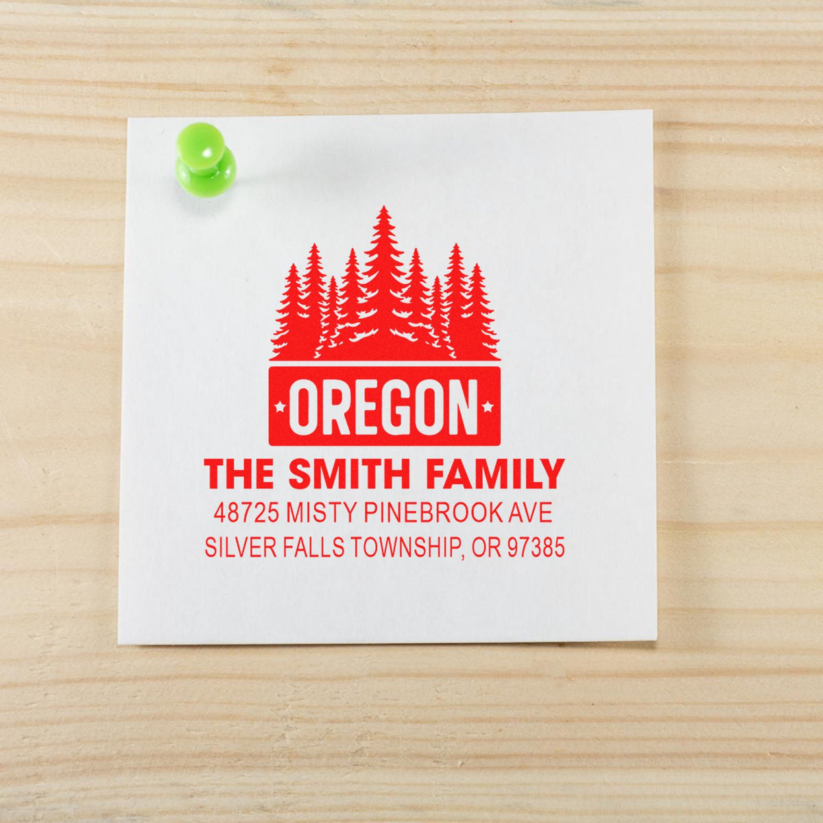 Personalized Oregon family address rubber stamp with pine tree design for envelopes, cards, and mailing labels.