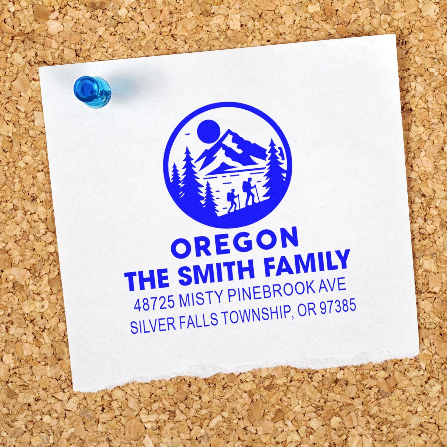 Custom Oregon family return address rubber stamp with hiking logo, stamped on paper for personalized mailing and branding.