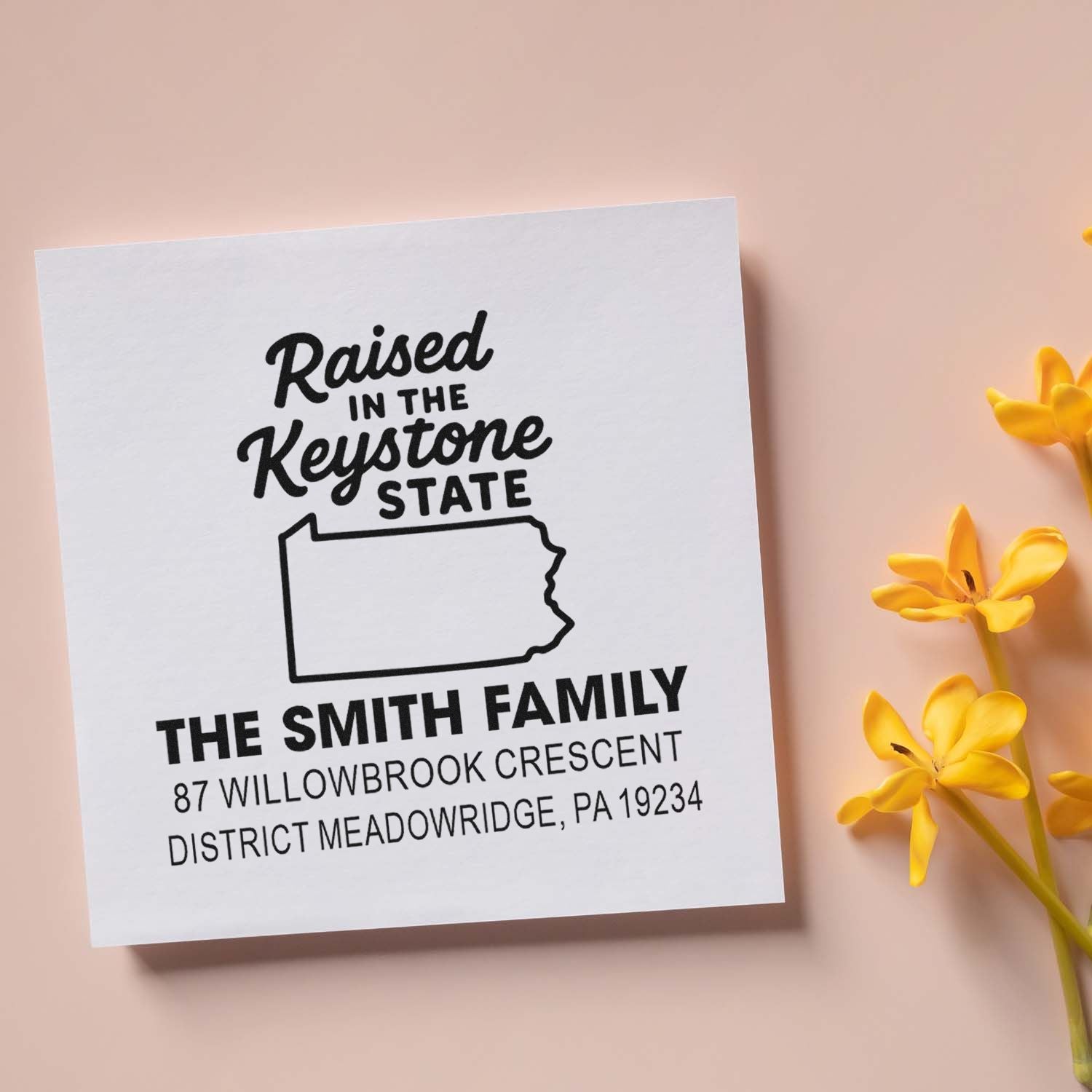 Custom Pennsylvania rubber address stamp with Raised in the Keystone State, family name, and address.