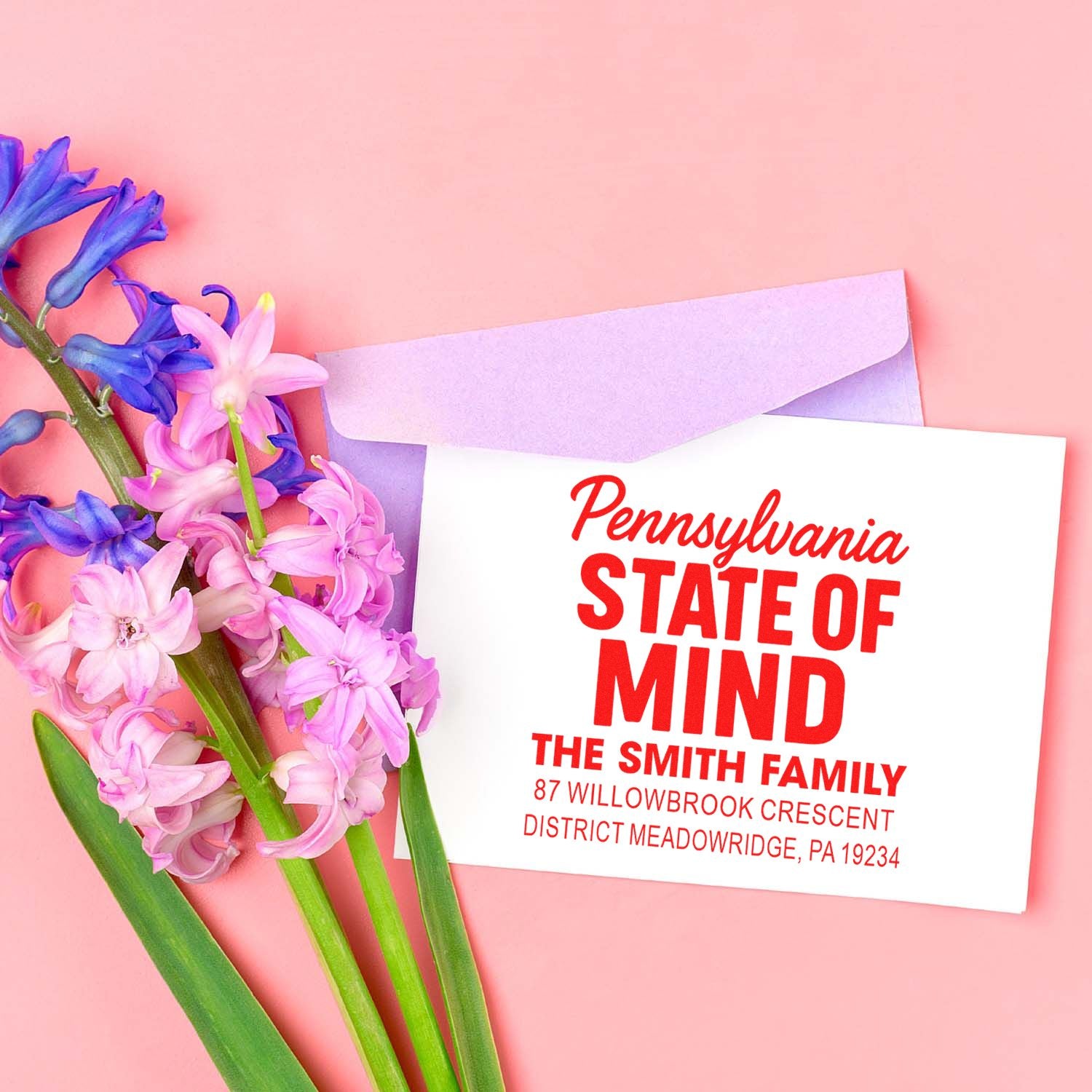 Personalized return address rubber stamp on lavender envelope, featuring Pennsylvania State of Mind family address design.