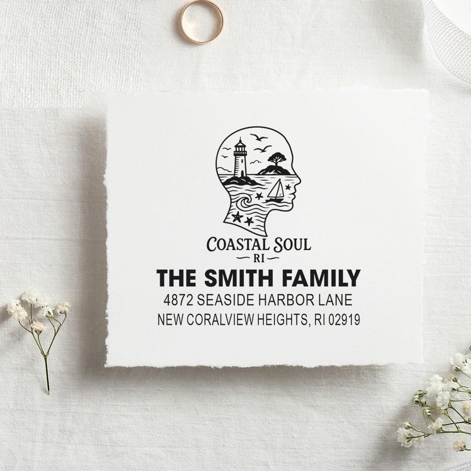 Personalized coastal return address rubber stamp with lighthouse design for The Smith Family, New Coralview Heights, RI.