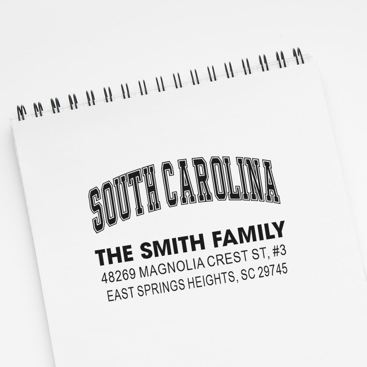Custom rubber stamp for South Carolina return address, featuring The Smith Family name and mailing details for personalized stationery.