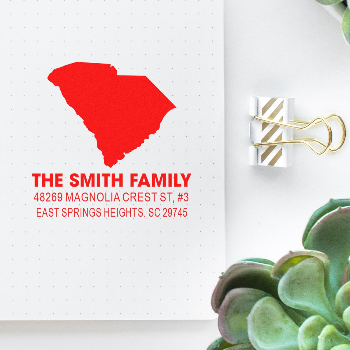 Custom South Carolina return address rubber stamp with family name and mailing address for personalized stationery.