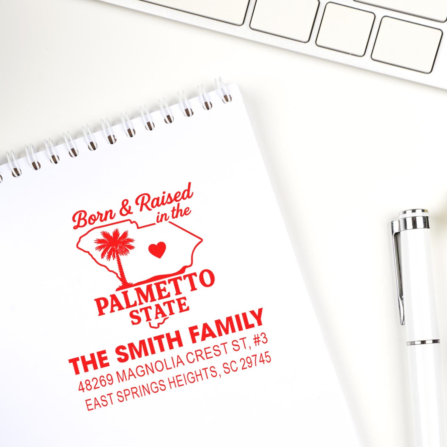 Personalized Palmetto State address rubber stamp with family name for custom stationery and mailings.