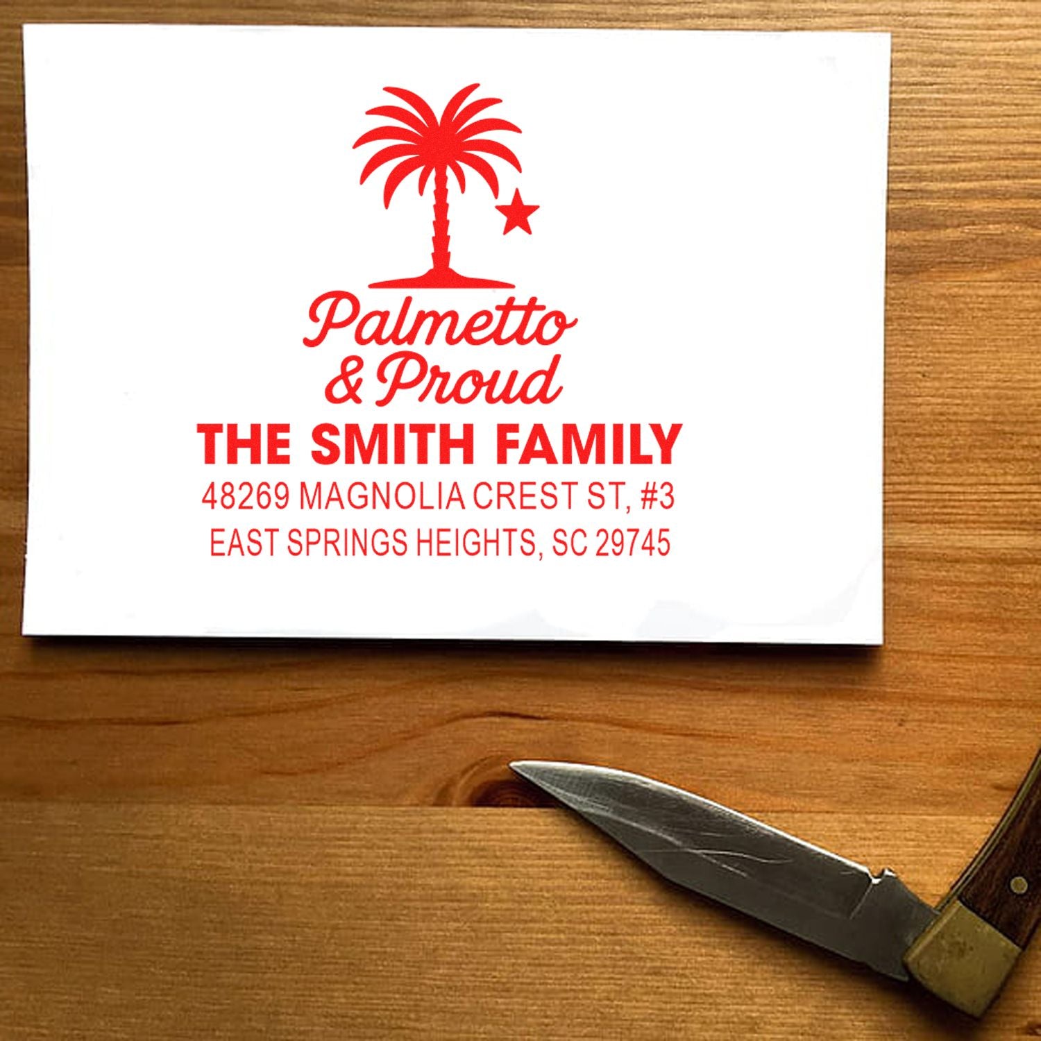 Custom Palmetto Proud rubber address stamp with palm tree logo for South Carolina family mail and stationery.