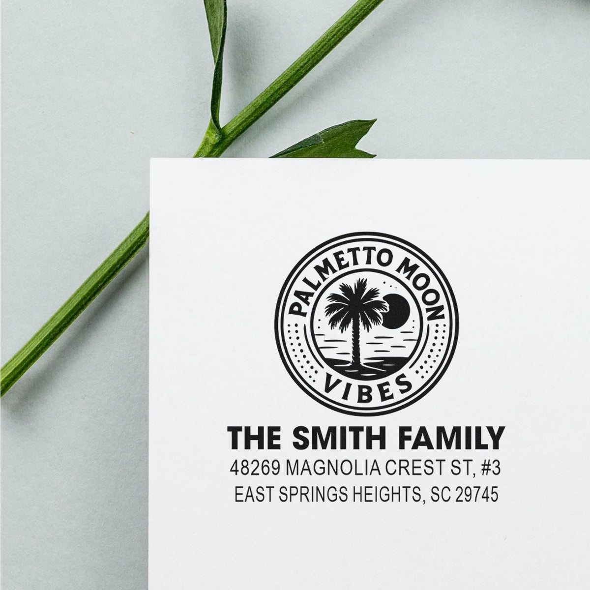 Custom return address rubber stamp featuring Palmetto Moon Vibes palm tree logo for The Smith Family.