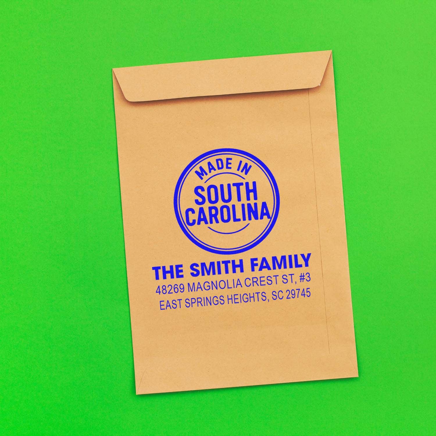 Custom return address rubber stamp on kraft envelope, featuring Made in South Carolina and The Smith Family address.