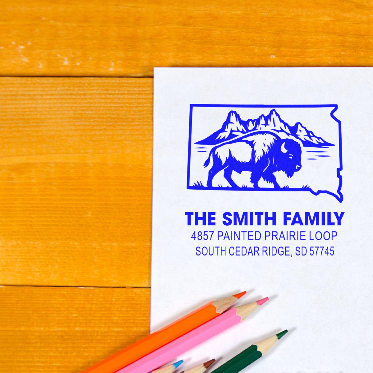Personalized address rubber stamp with bison and South Dakota outline for The Smith Family, ideal for custom mailings.