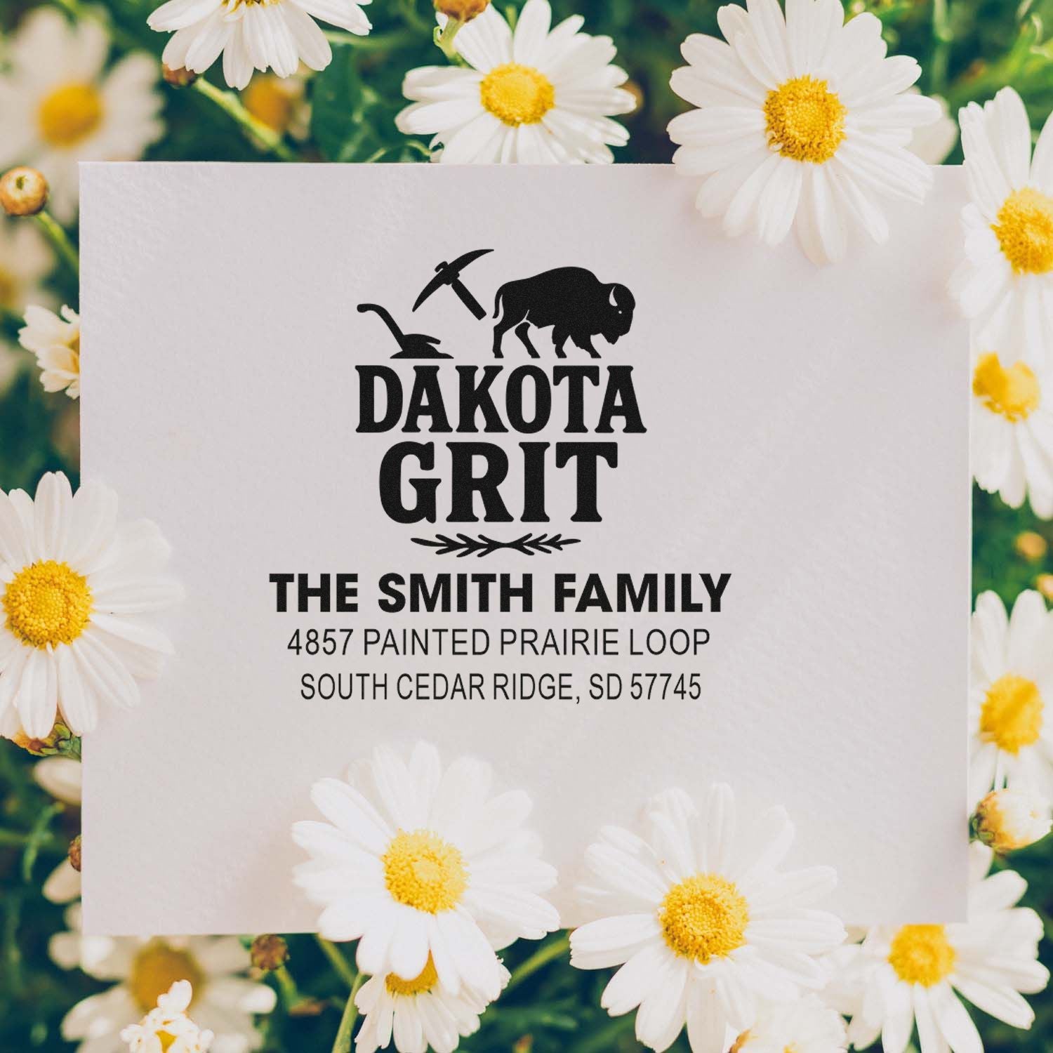 Custom rubber address stamp with Dakota Grit bison logo and Smith family return address for personalized mailings.