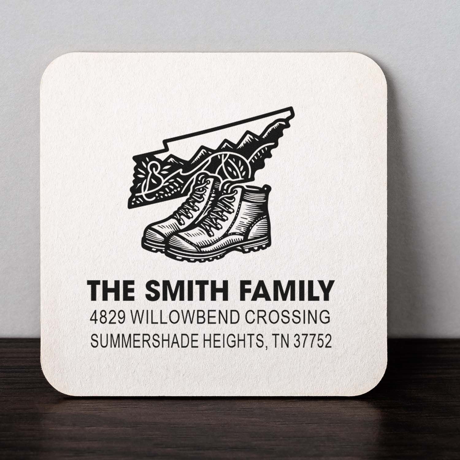 Custom family address rubber stamp with Tennessee boots design for personalized mail and stationery.