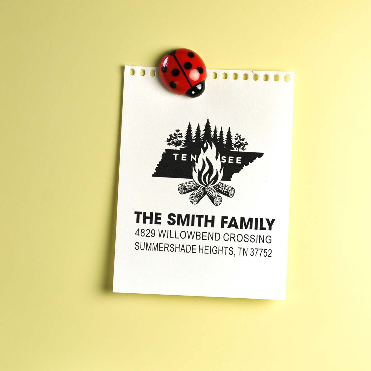 Custom Tennessee family return address rubber stamp for The Smith Family, featuring a campfire state design and printed address.