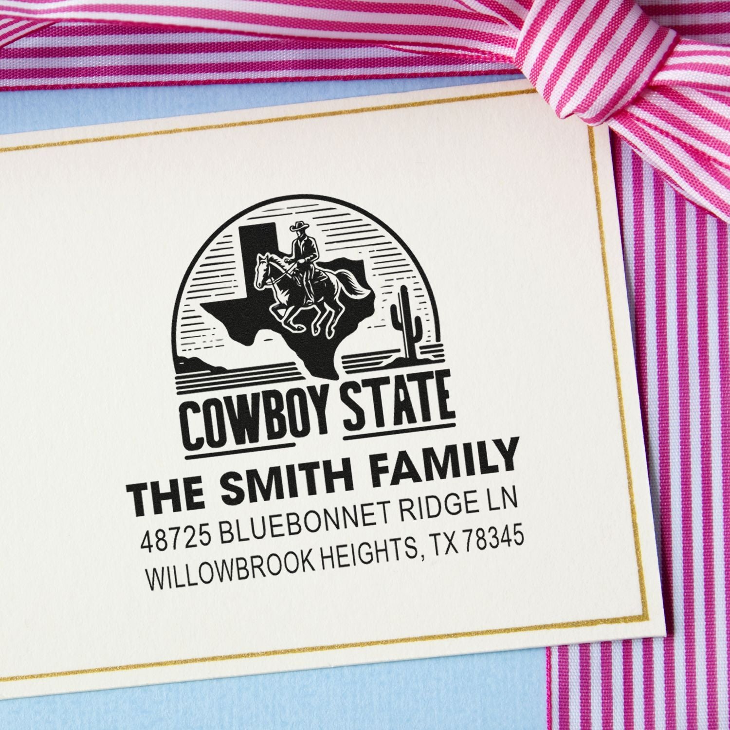 Custom return address rubber stamp with Texas cowboy state design for the Smith family.