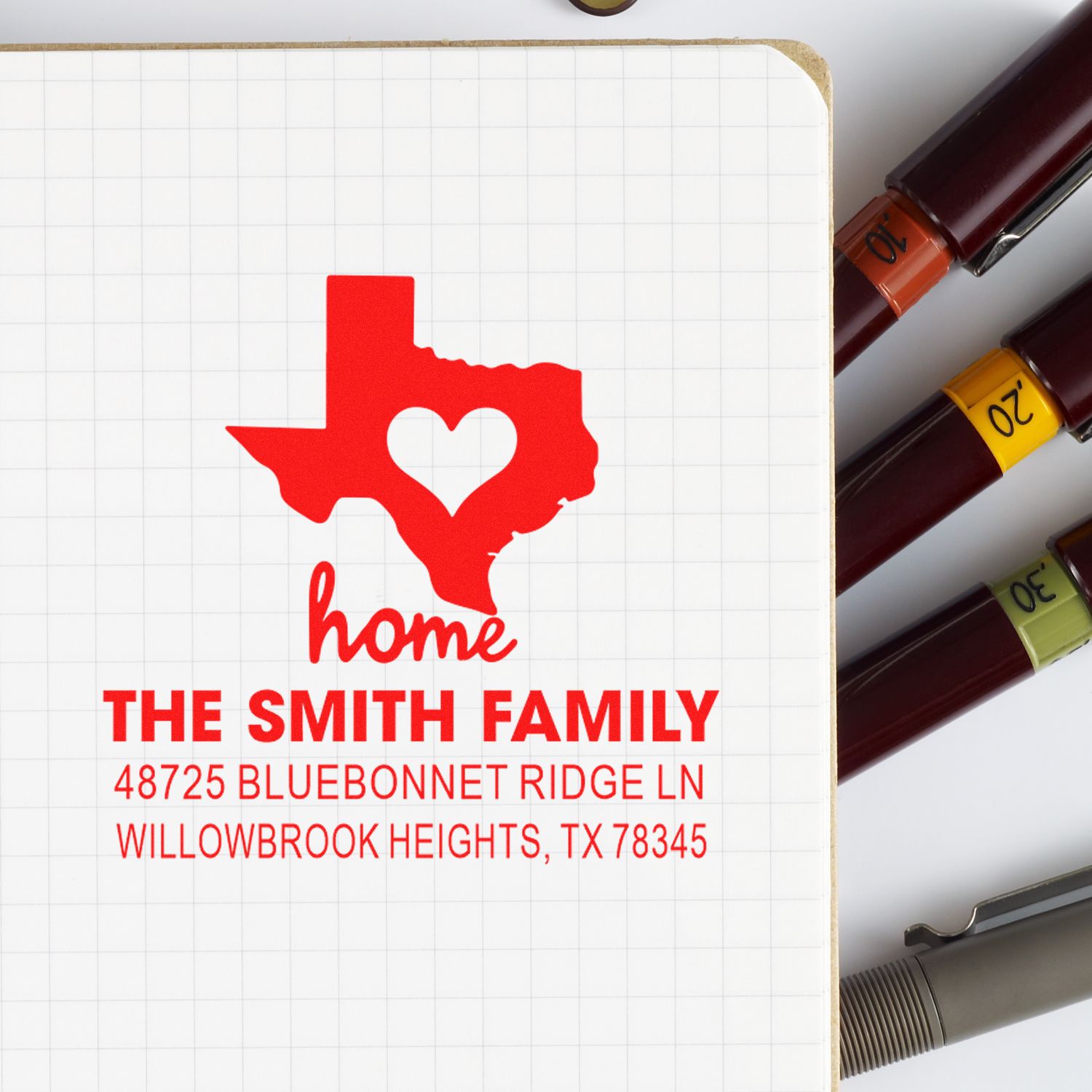 Custom return address rubber stamp with Texas home design, family name, and address for mailing envelopes